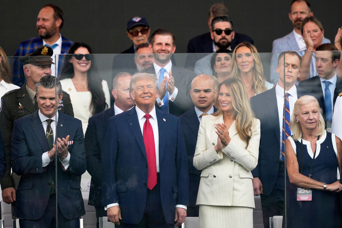 Military parade kicks off early amid rainfall as Trump looks on and brushes off ‘No Kings’ protests