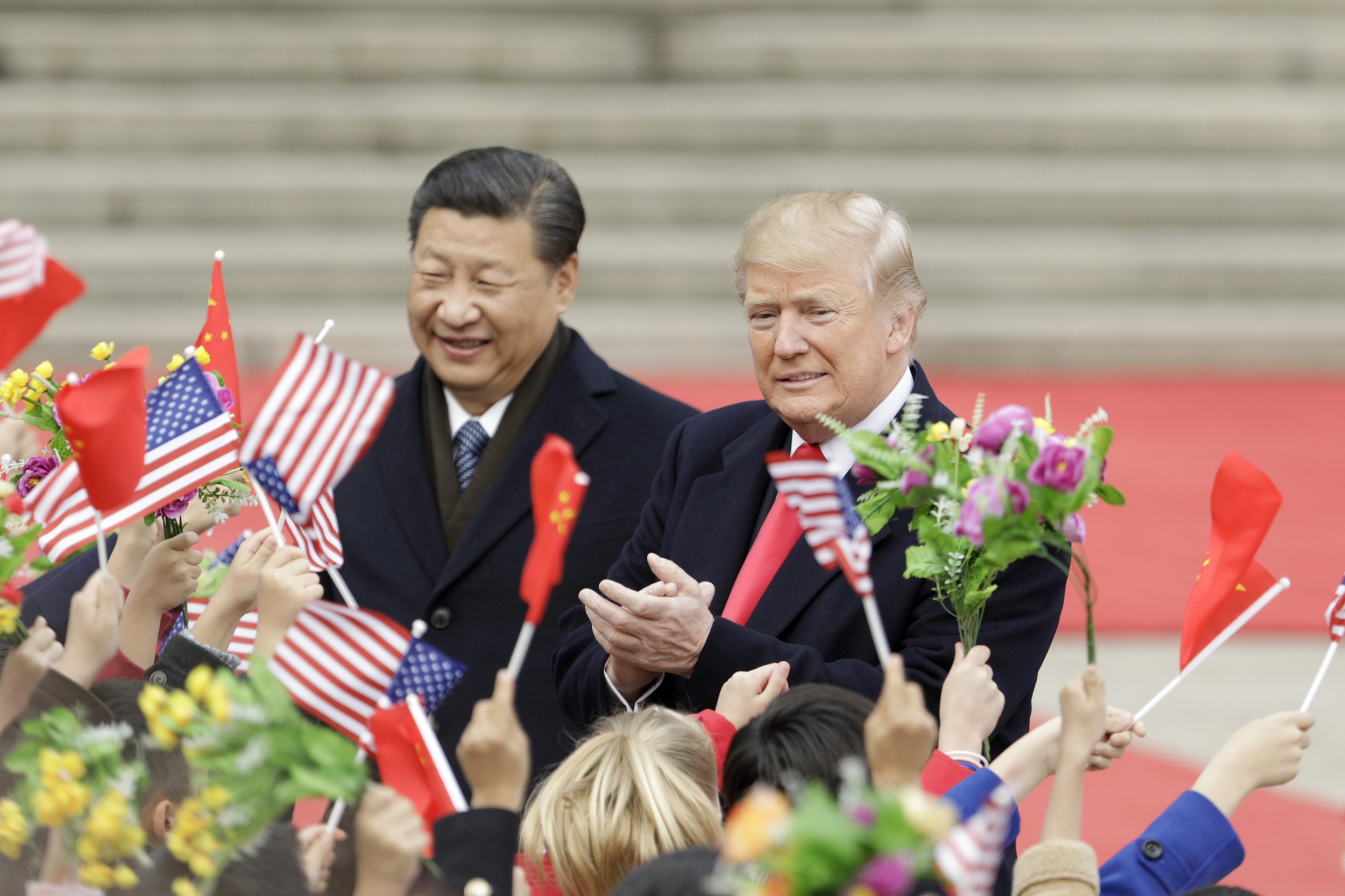 President Donald Trump and Xi Jinping outside the Great Hall of the People in Beijing on Nov. 9, 2017.