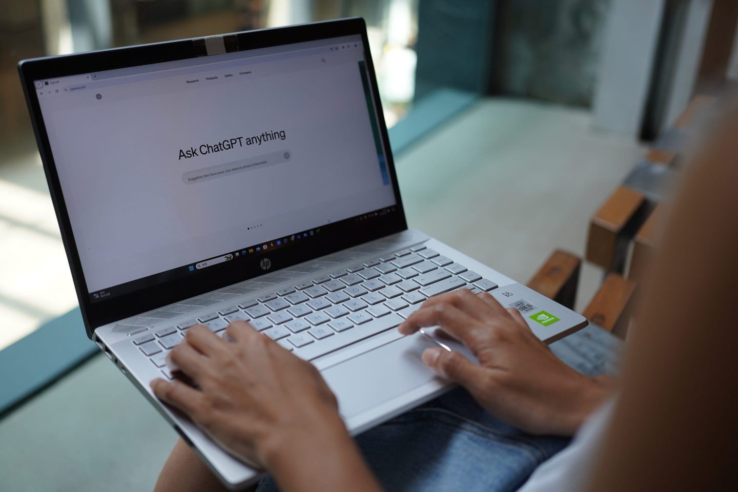 person typing into ChatGPT