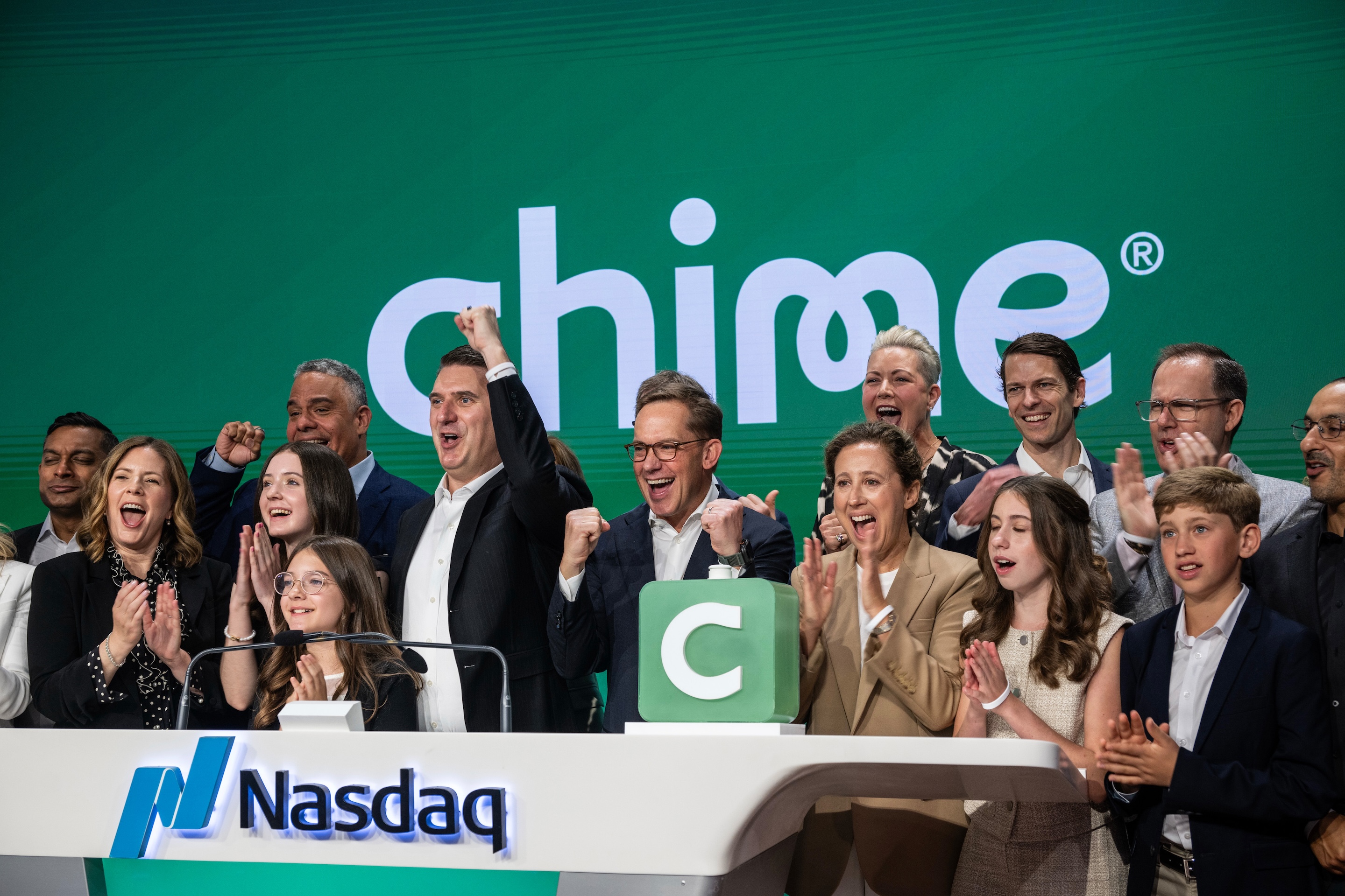 Ryan King, co-founder of Chime Financial Inc., center left, and Chris Britt, cofounder and chief executive officer of Chime Financial Inc., center, during the company's initial public offering at the Nasdaq