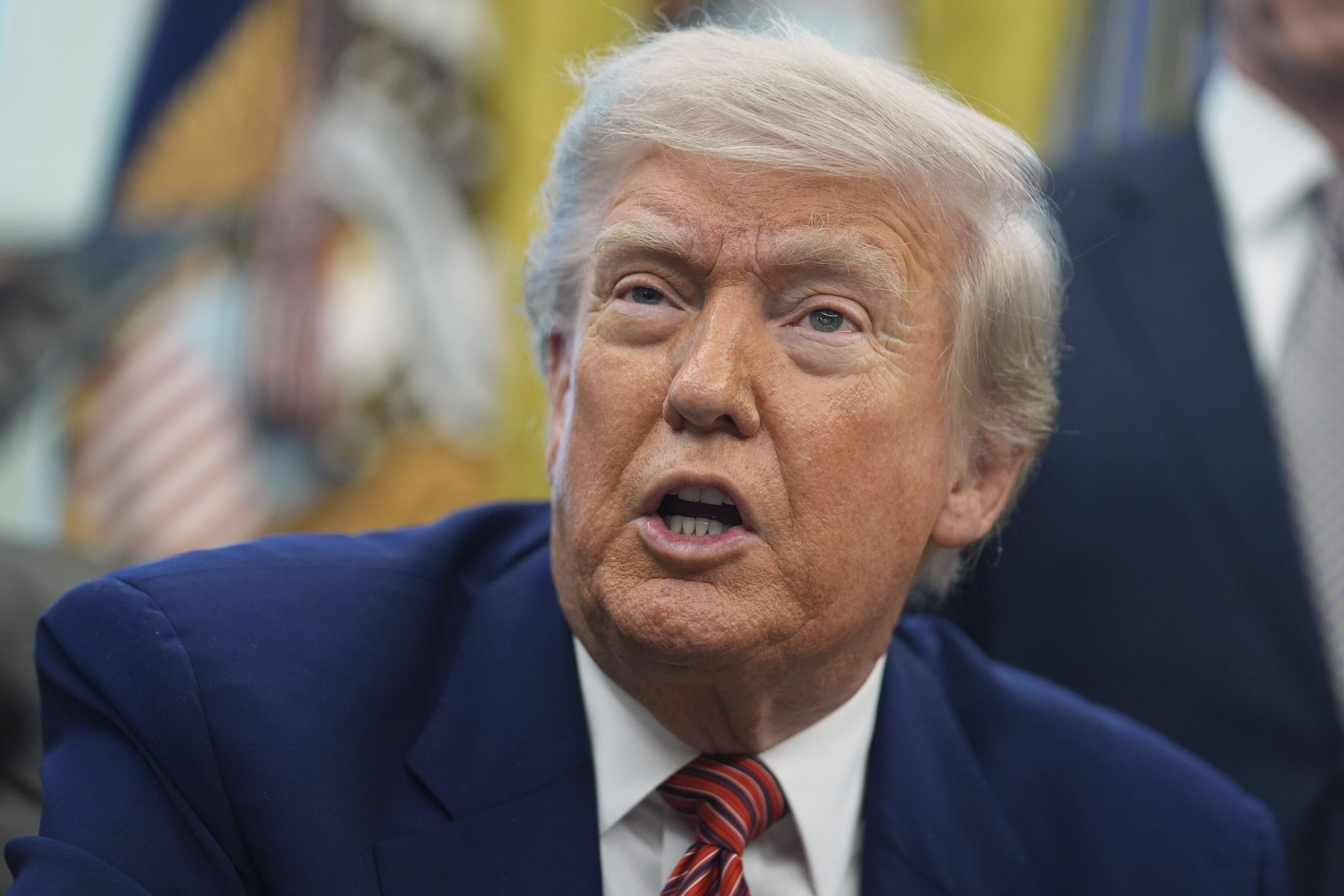 President Donald Trump speaks to reporters in the Oval Office of the White House, May 23, 2025, in Washington.