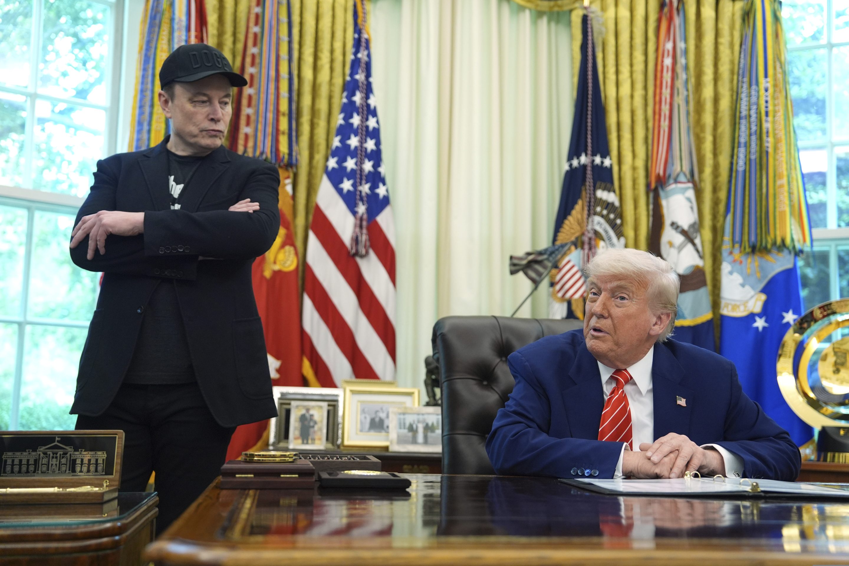 President Donald Trump, right, speaks during a news conference with Elon Musk in the Oval Office of the White House, on May 30, 2025, in Washington.