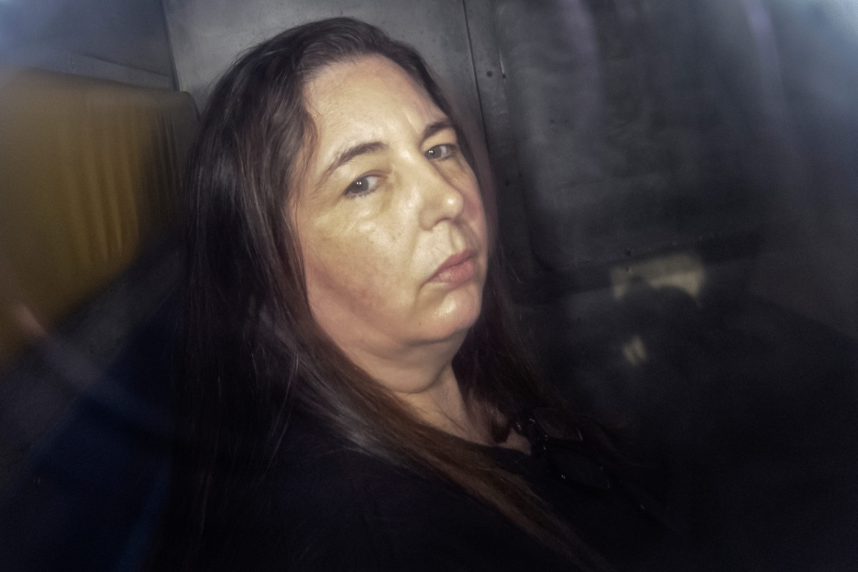 Erin Patterson arriving in the back of a prison transport vehicle at Latrobe Valley Magistrate's Court in Morwell, Australia, on May 12, 2025.
