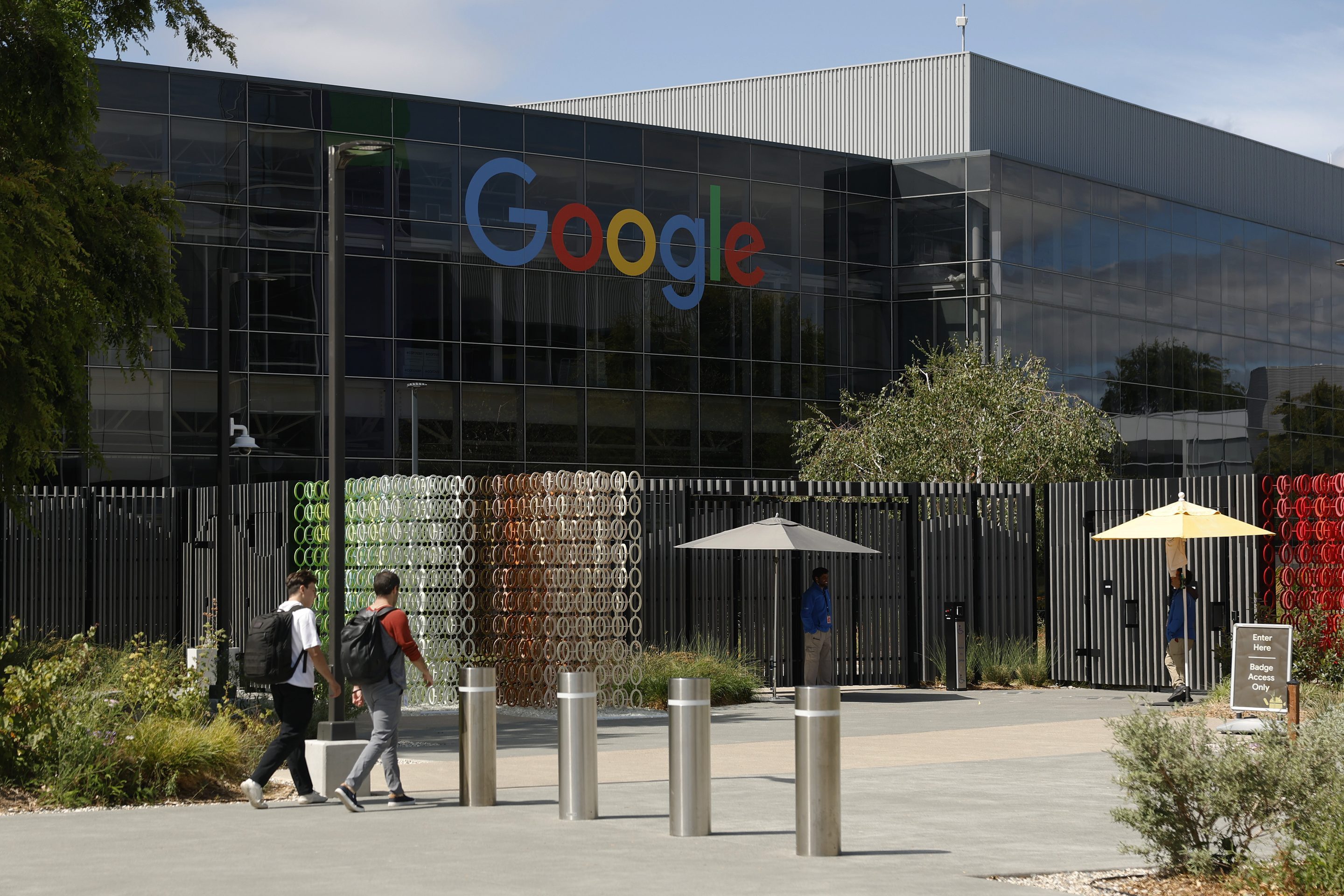 Google employees in front of Google HQ