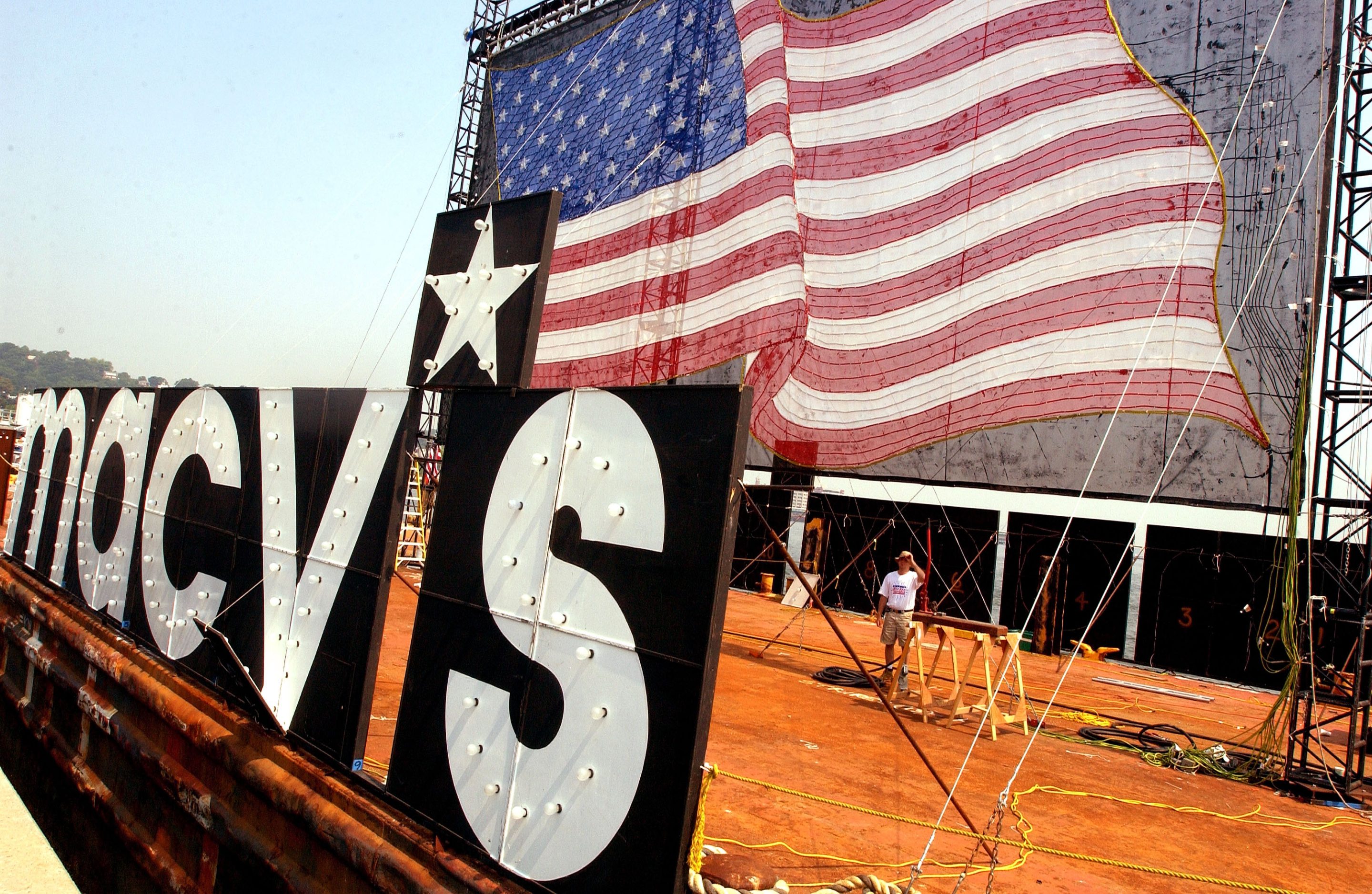 A worker makes final preparations for the Macy's July 4th fireworks display in New York City on July 2, 2002. Macy's is one of many companies that are around 200 years old, and still placing on the Fortune 500.