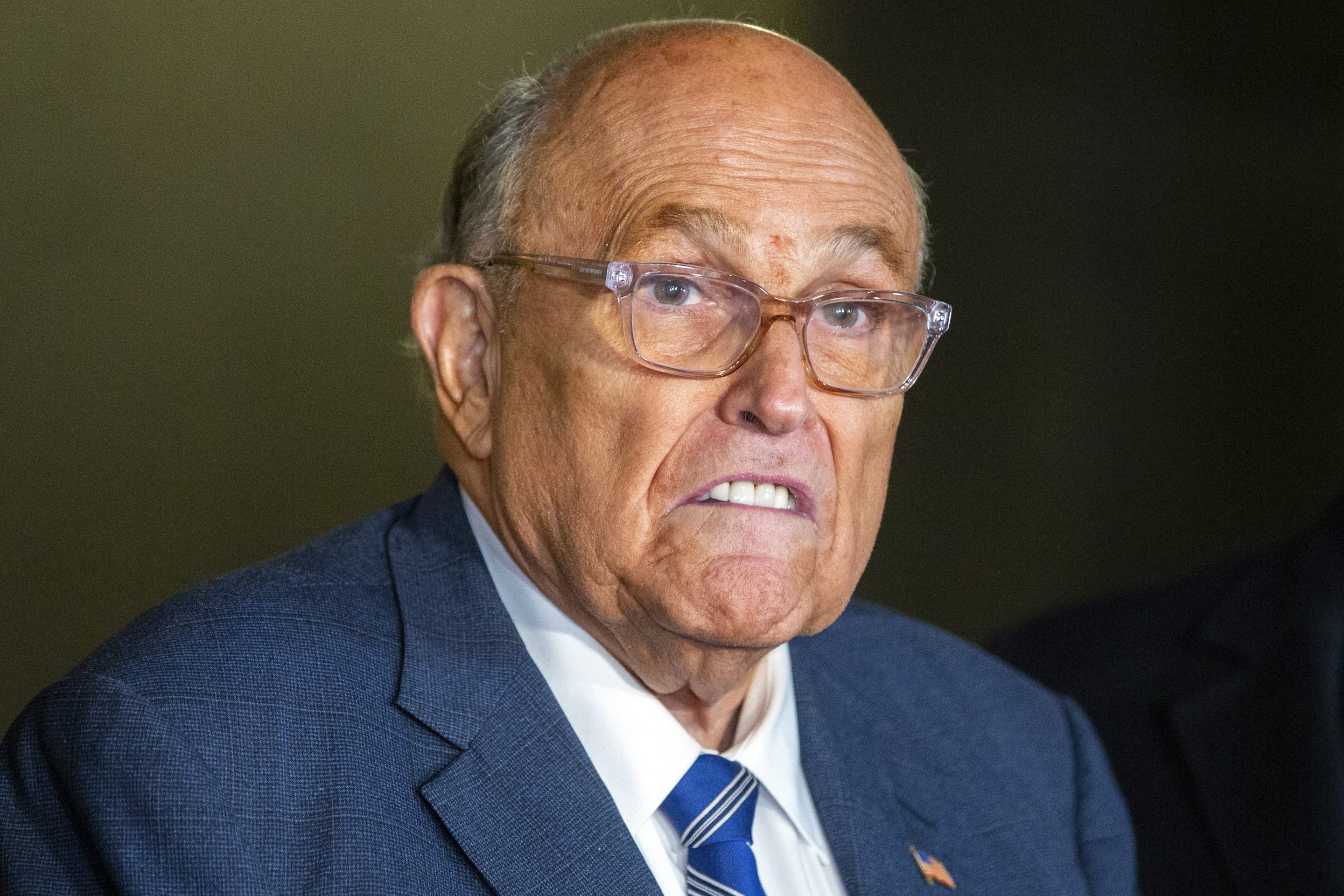 Rudy Giuliani speaks to the media outside Manhattan federal court in New York on Jan. 3.