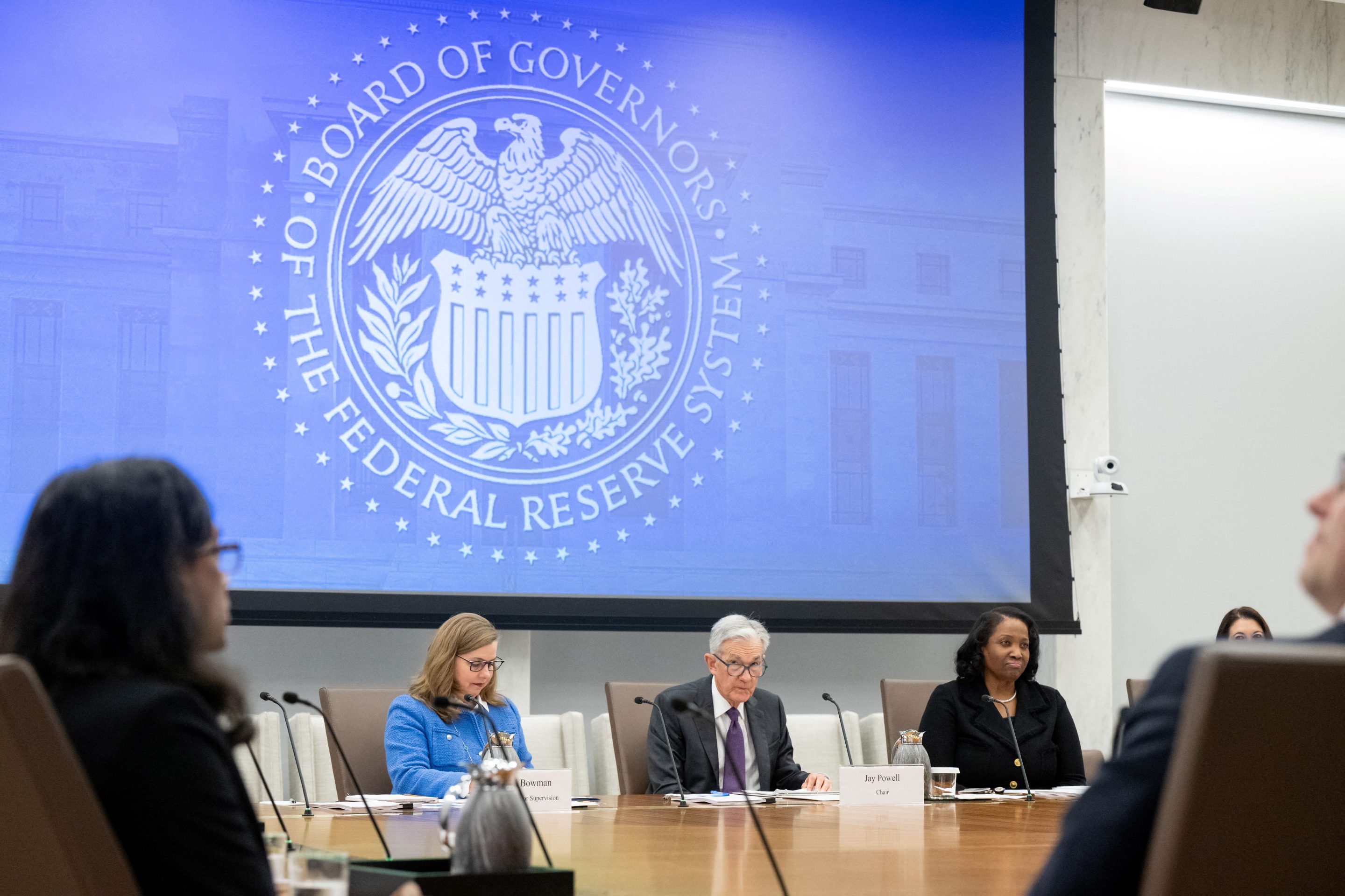Chairman of the US Federal Reserve Jerome Powell speaks alongside Michelle Bowman (L), Board Vice Chair for Supervision, and Lisa Cook (R), Board Governor, as he chairs a Federal Reserve Board open meeting on June 25.
