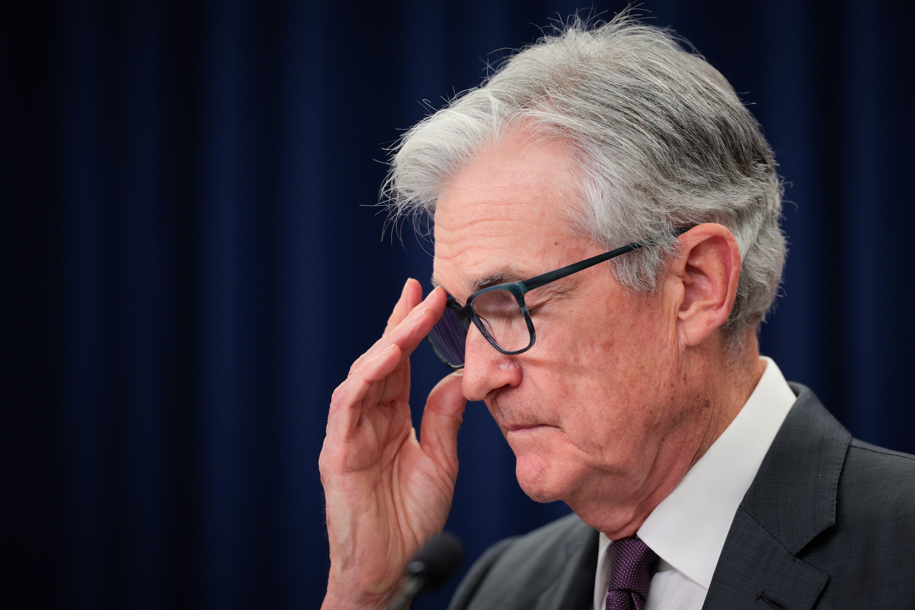 Federal Reserve Chair Jerome Powell talks with reporters following Federal Open Market Committee meetings on July 30, 2025.
