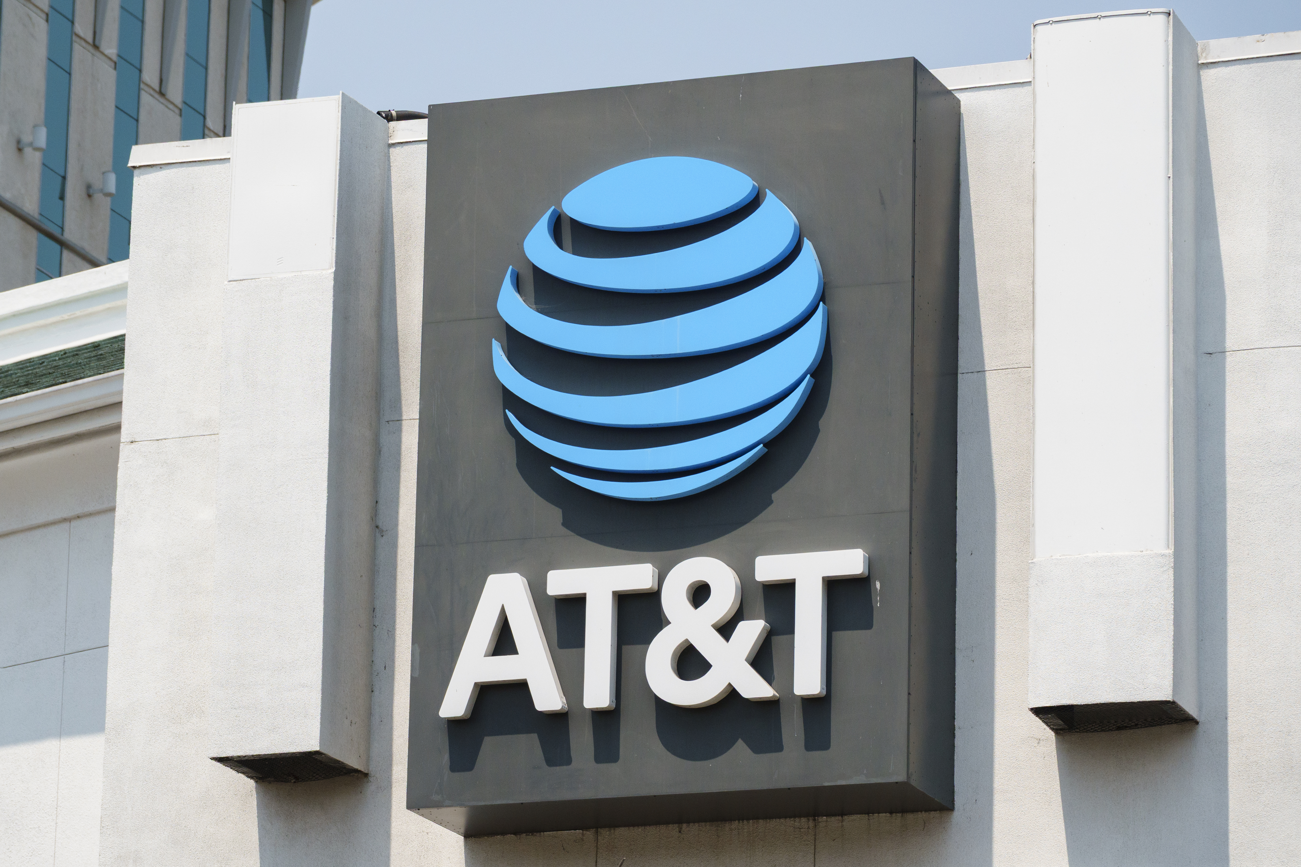 An AT&T corporate logo displayed outside a store on August 2, 2025 in San Diego, California.