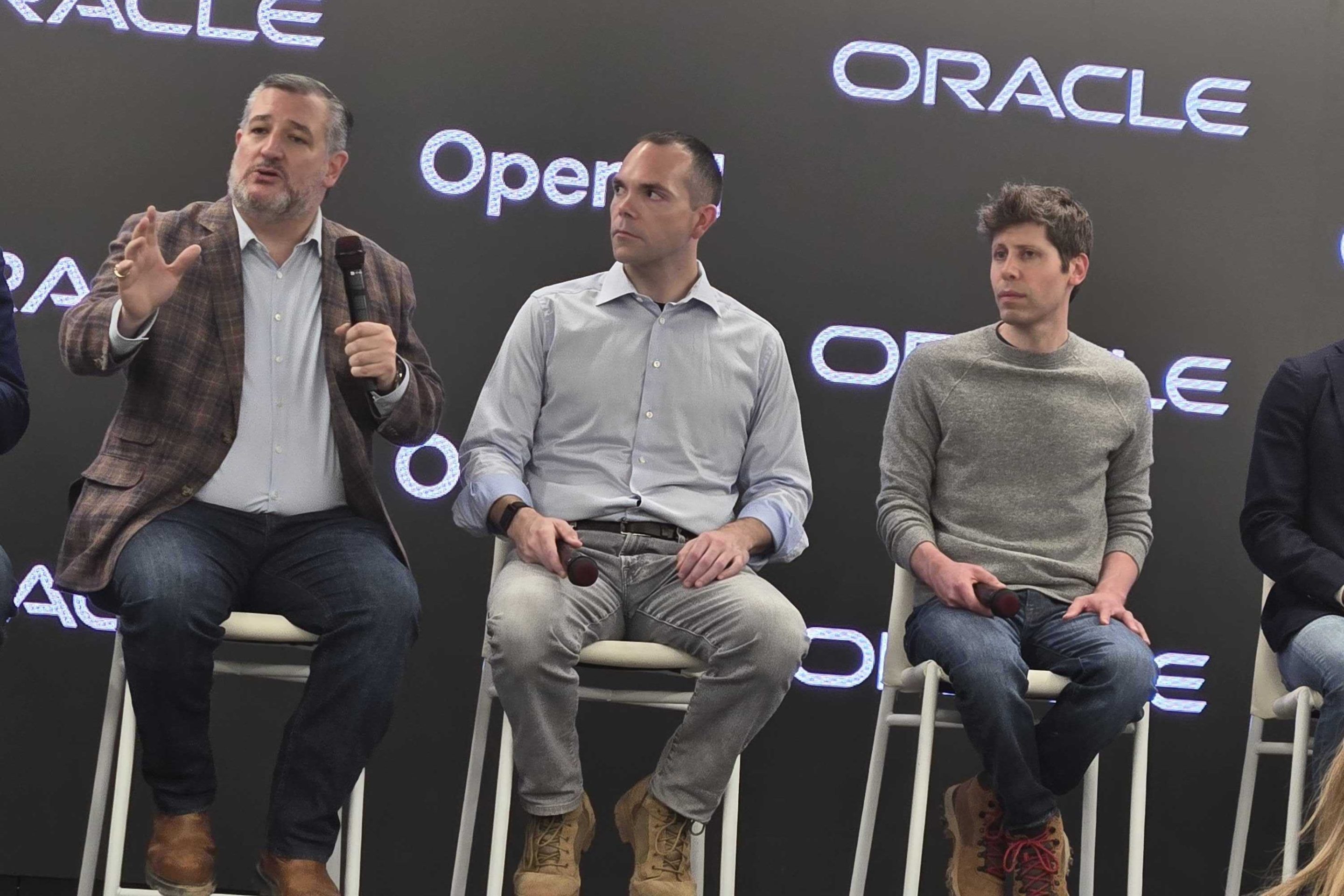 (L-R) Texas Senator Ted Cruz, Oracle co-CEO Clay Magouyrk, and OpenAI CEO Sam Altman talk datacenter plans in Abilene, Texas.