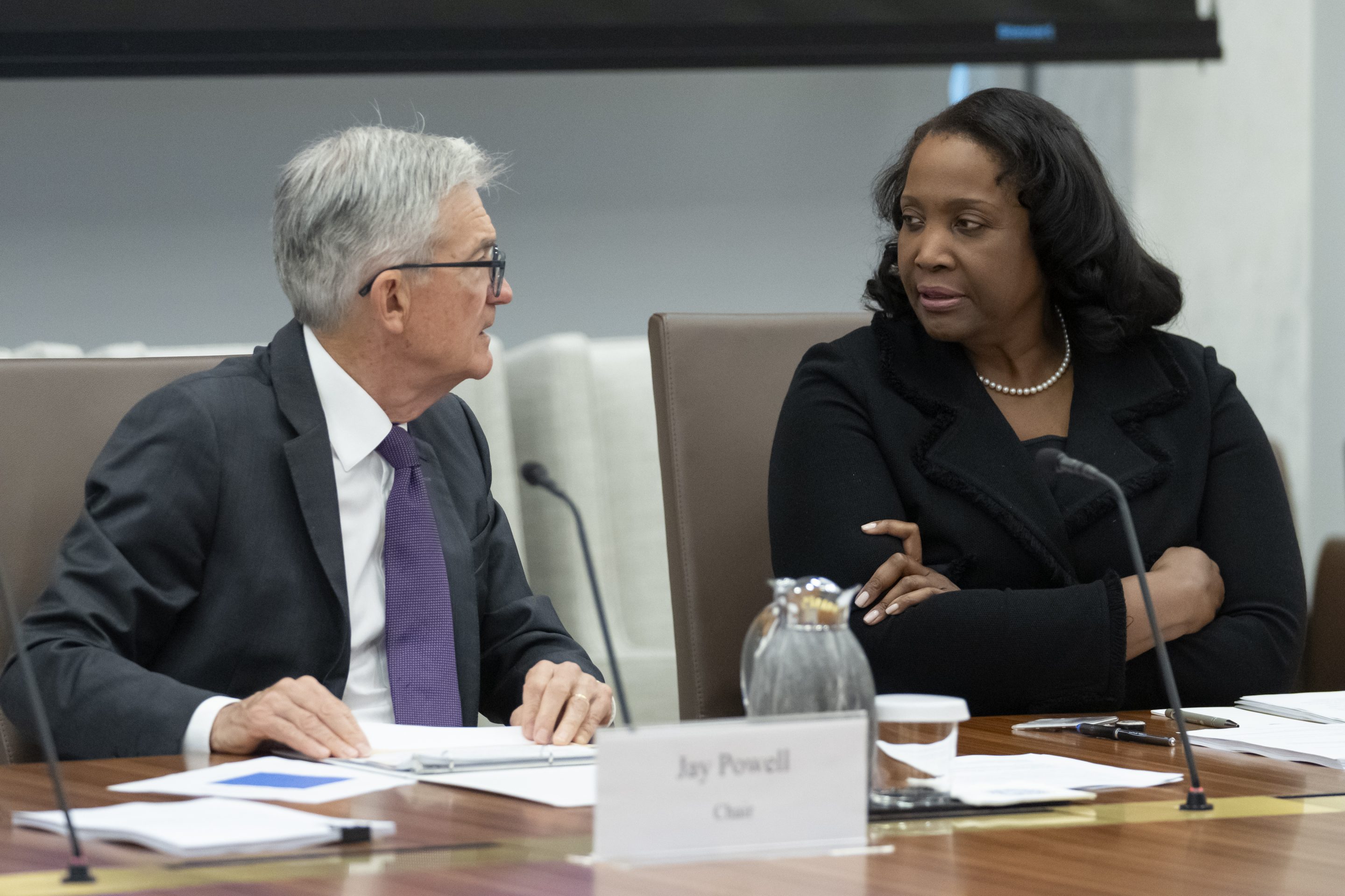 Federal Reserve Chairman Jerome Powell with Board of Governors member Lisa Cook, right, during an open meeting on June 25.