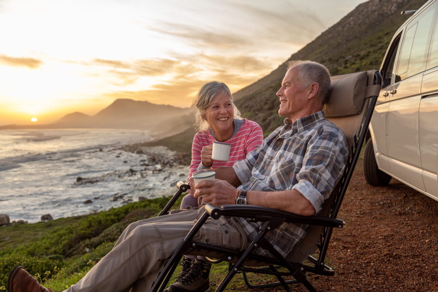 Retirees in country sitting on chairs