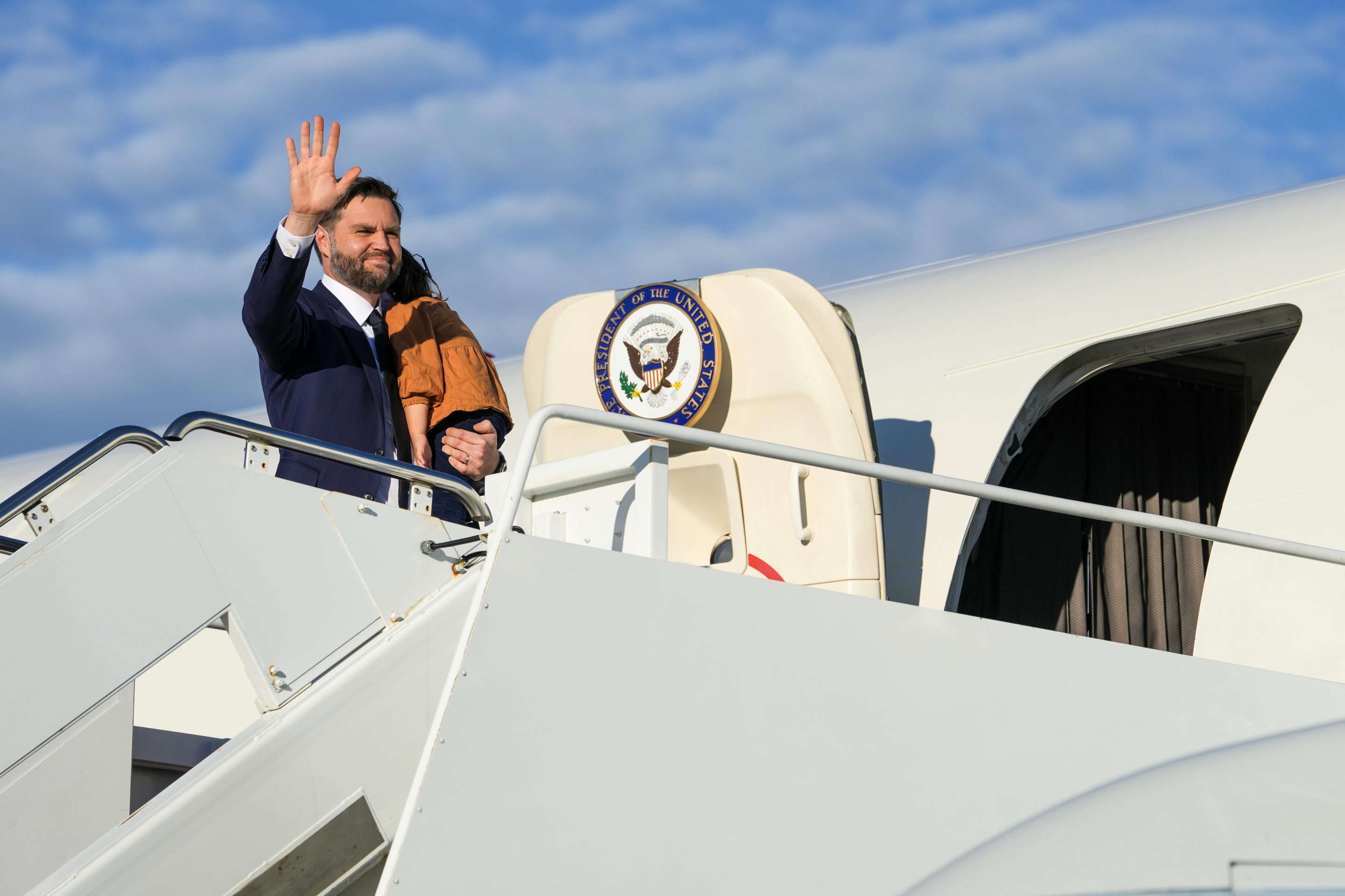 Vice President JD Vance boards Air Force Two at Joint Base Andrews, Md., on Friday.