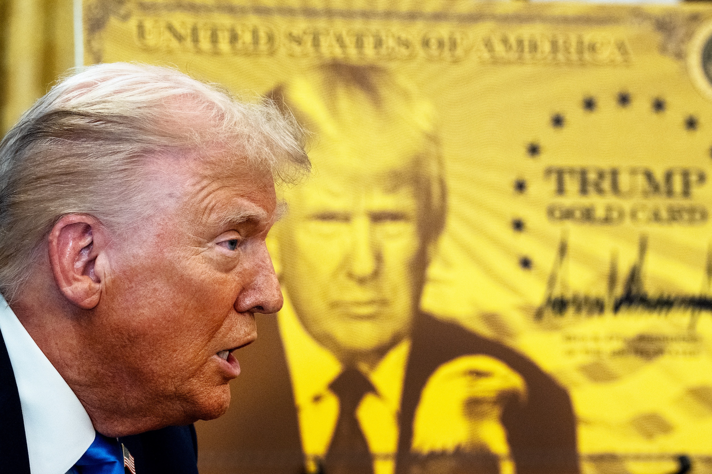 Photo: WASHINGTON, DC September 19: US President Donald Trump during the signing executive orders in the Oval Office at the White House on Friday September 19, 2025. President Trump signed a two executive orders establishing the "Trump Gold Card" and introducing a $100,000 fee for H-1B visas. The "Trump Gold Card" is a visa program that allows foreign nationals permanent residency and a pathway to U.S. citizenship. (Photo by Demetrius Freeman/The Washington Post via Getty Images)