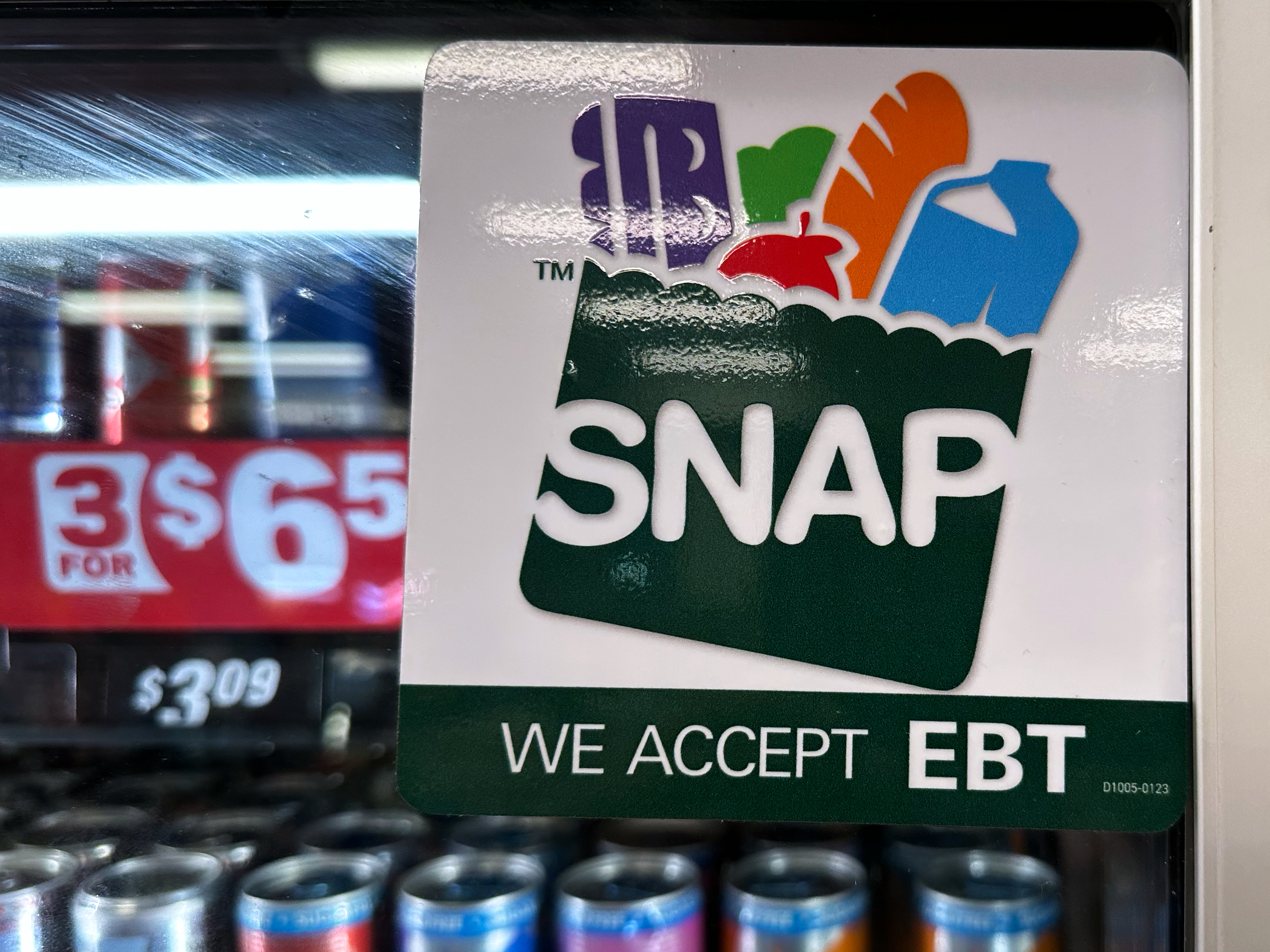 SNAP EBT information sign is displayed at a gas station in Riverwoods, Ill., Saturday, Nov. 1, 2025.