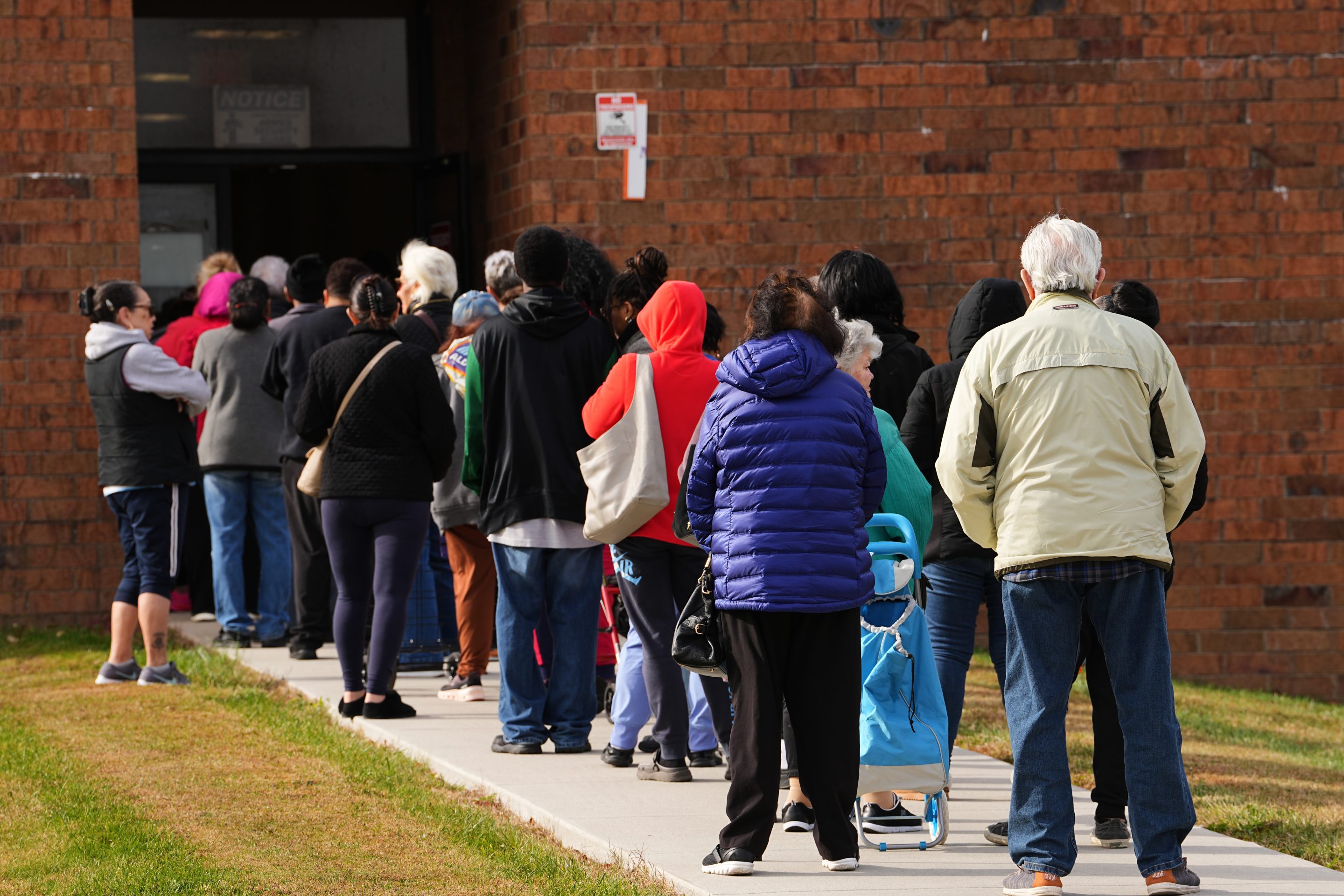 People wait in line durning an emergency food distribution at The Jewish Federation of Greater Philadelphia's Mitzvah Food Program in Philadelphia, Friday, Nov. 7, 2025.