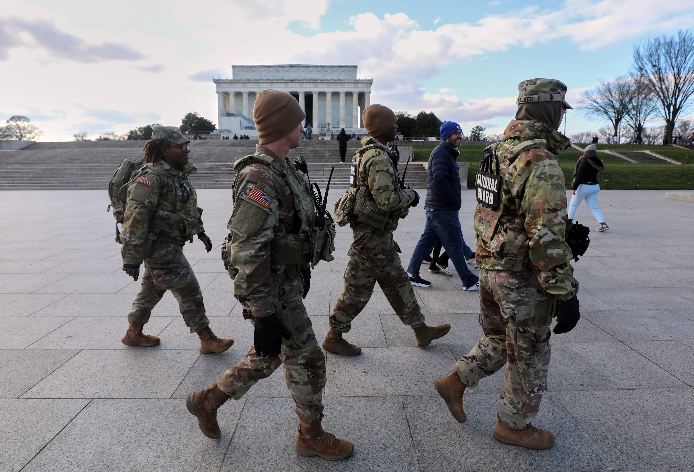 National Guard patrol the National Mall near the Lincoln Memorial, Friday, Nov. 28, 2025, in Washington. 