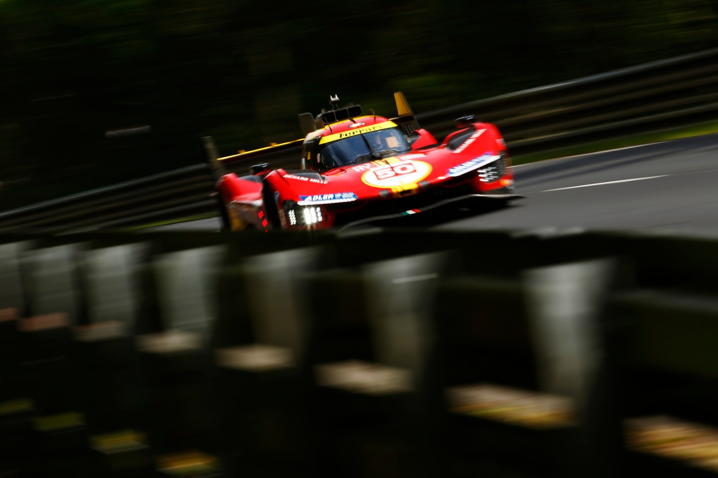 A Ferrari race car on a racetrack