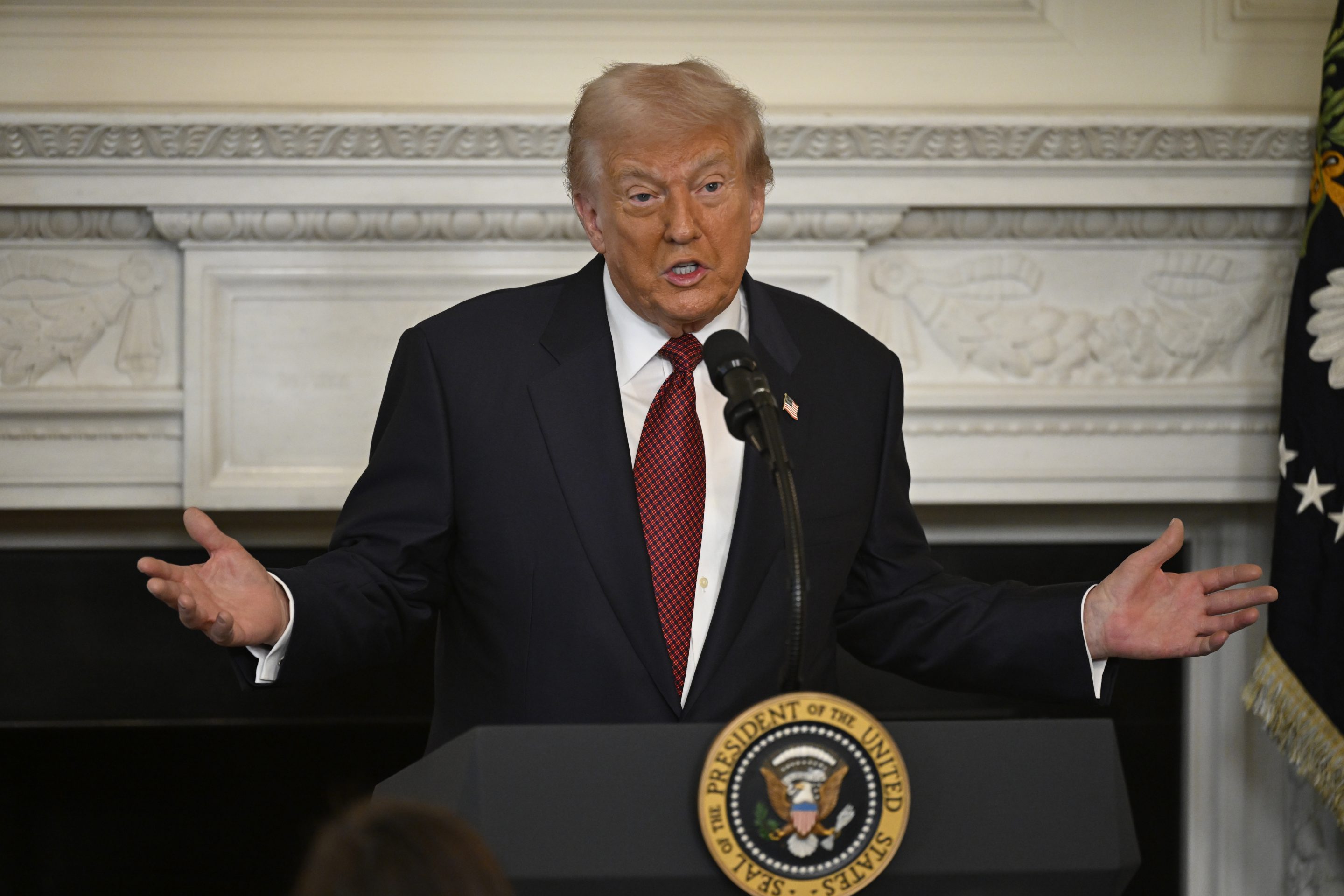 President Donald Trump addresses a breakfast for Republican senators in the State Dinning at the White House in Washington, DC on November 5, 2025.