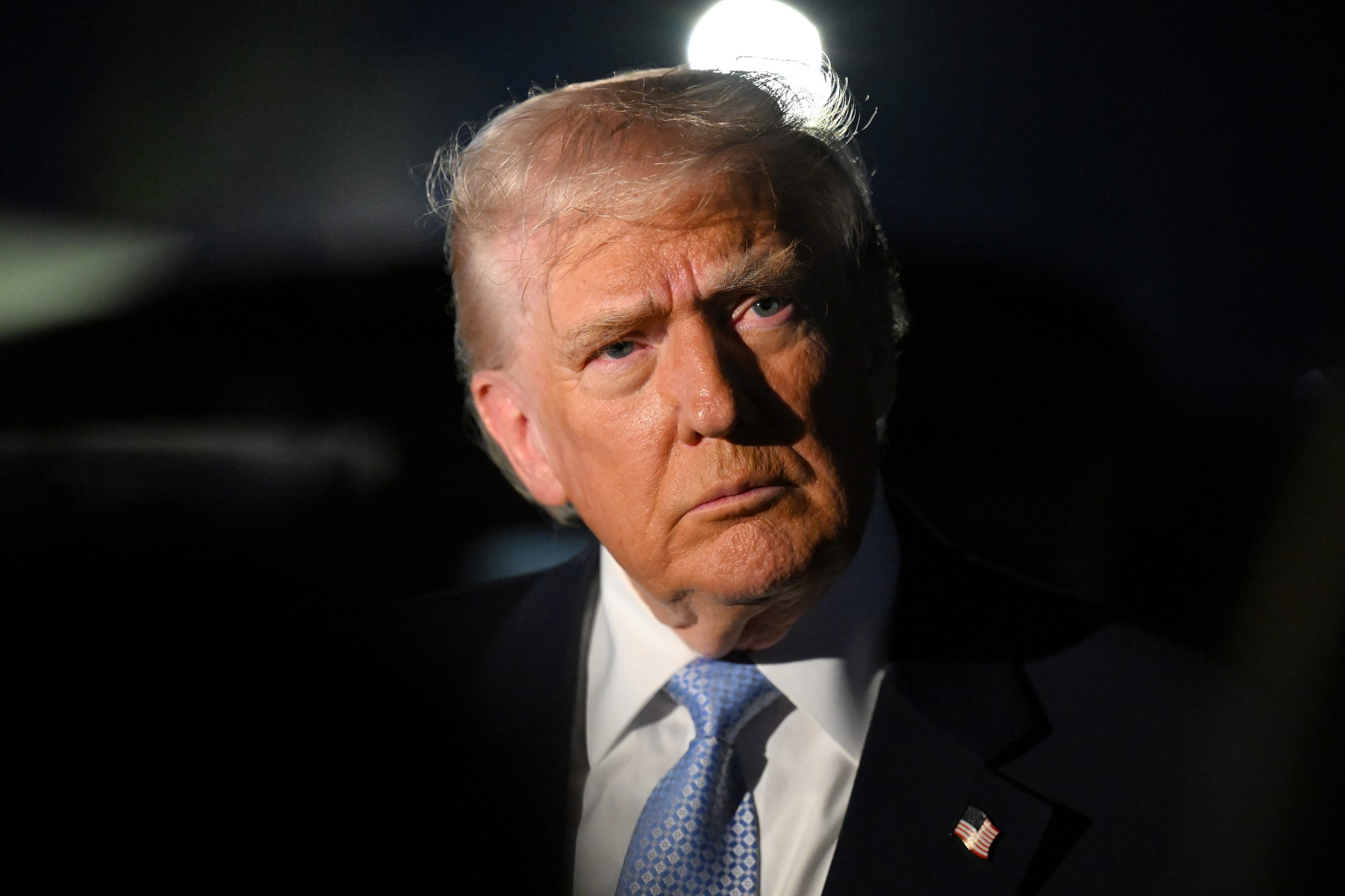 U.S. President Donald Trump speaks to reporters before boarding Air Force One on November 16, 2025 at Palm Beach International Airport in West Palm Beach, Florida.
