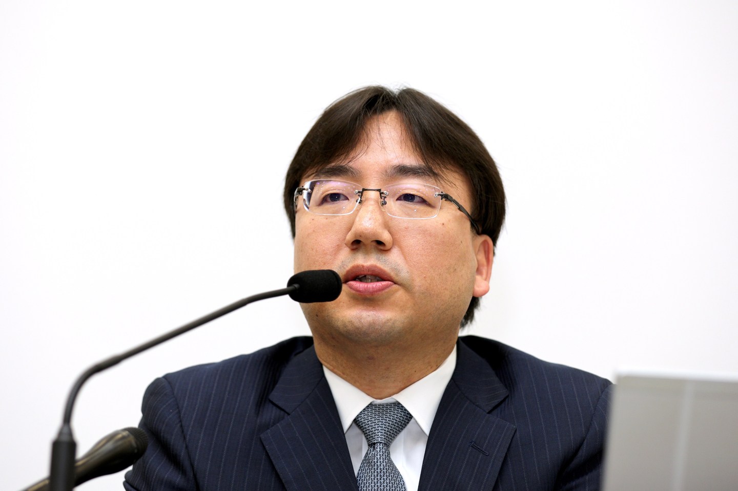 Shuntaro Furukawa, president of Nintendo Co., speaks during a news conference in Osaka, Japan, on Thursday, April 25, 2019. Nintendo gave a double dose of disappointment by posting earnings below analyst estimates and signaled that it would not introduce a highly anticipated new model of the Switch game console at a June trade show. Photographer: Buddhika Weerasinghe/Bloomberg via Getty Images