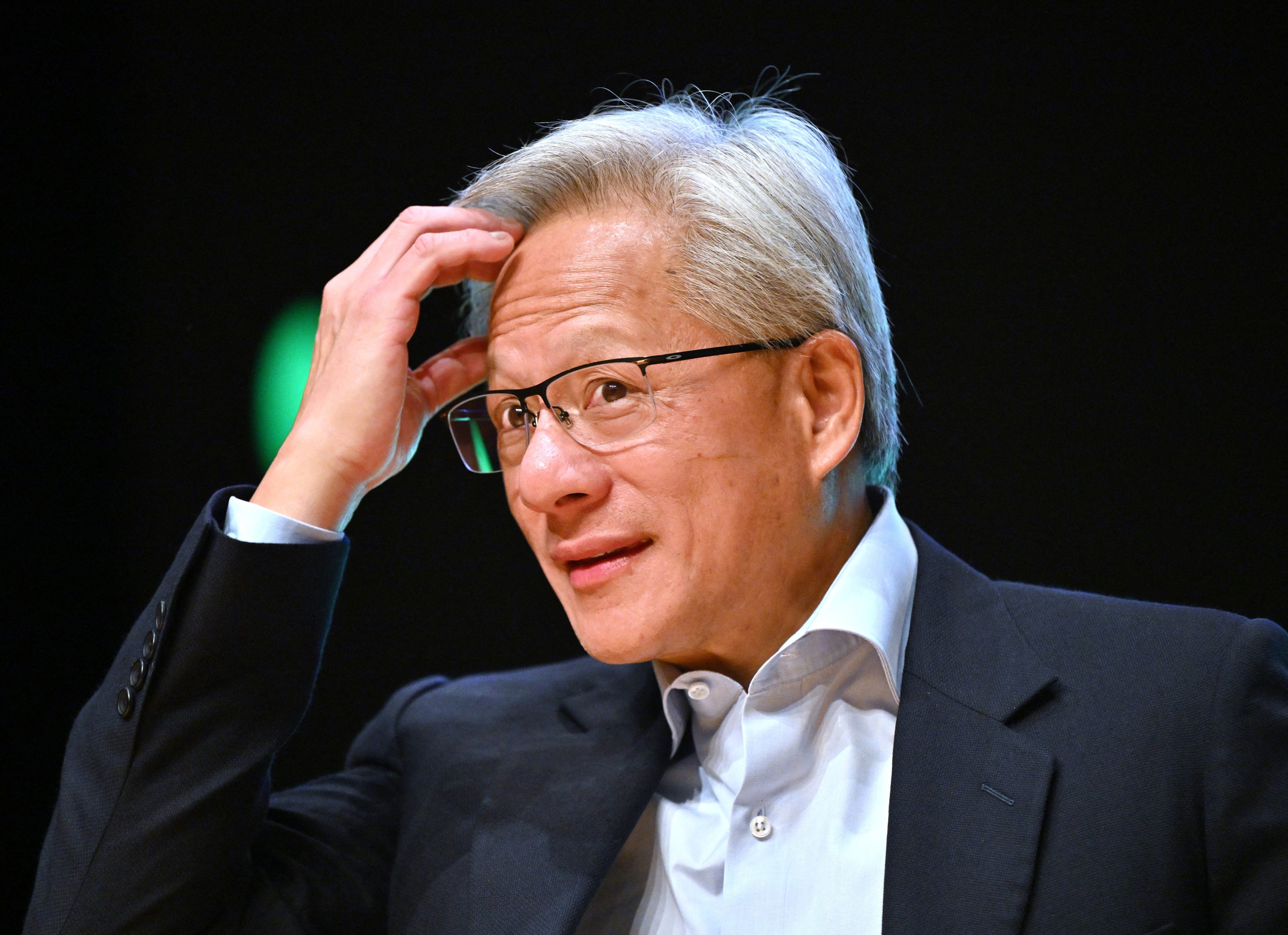Nvidia founder and CEO Jensen Huang reacts during a press conference at the Asia-Pacific Economic Cooperation (APEC) CEO Summit in Gyeongju on October 31, 2025.