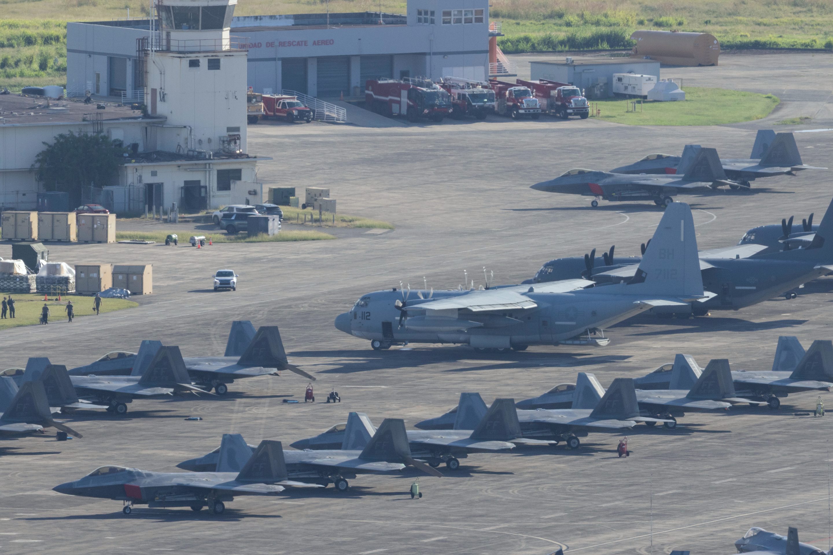 U.S. military aircraft are parked on the tarmac at Jose Aponte de la Torre Airport in Ceiba, Puerto Rico, Saturday, Jan. 3, 2025.