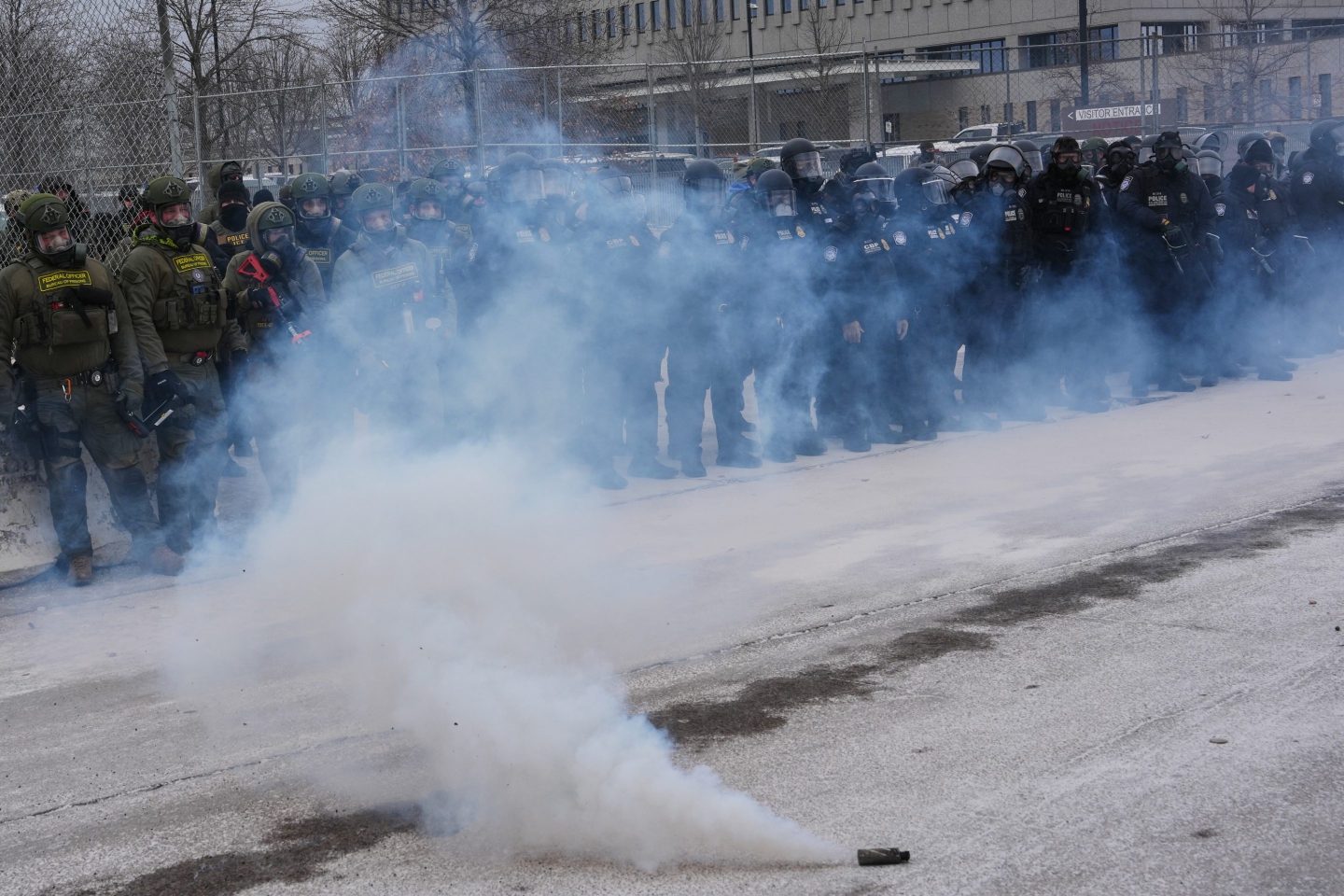 Judge rules feds in Minneapolis immigration raids can’t detain or tear gas peaceful protesters, including observers and people in cars