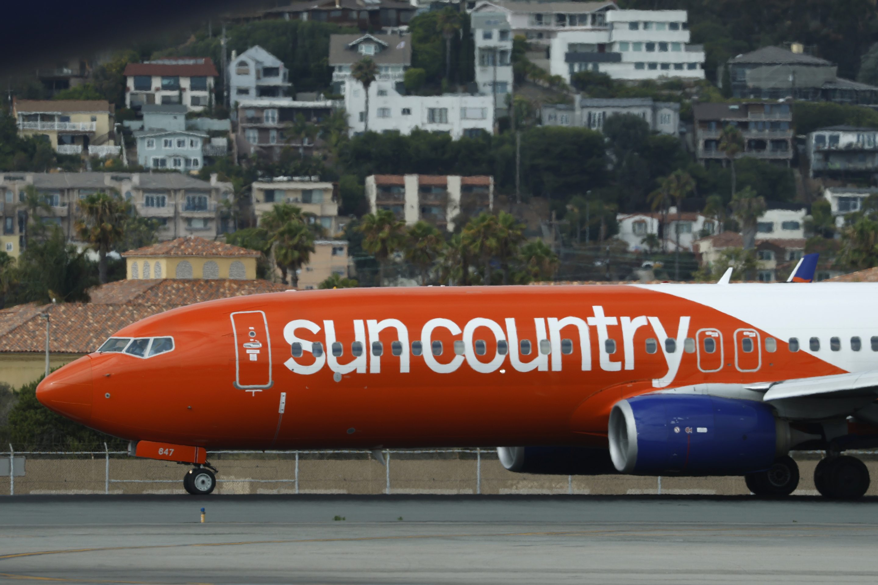 A Sun Country Airlines Boeing 737 arrives at San Diego International Airport on August 15, 2025 in San Diego, California.