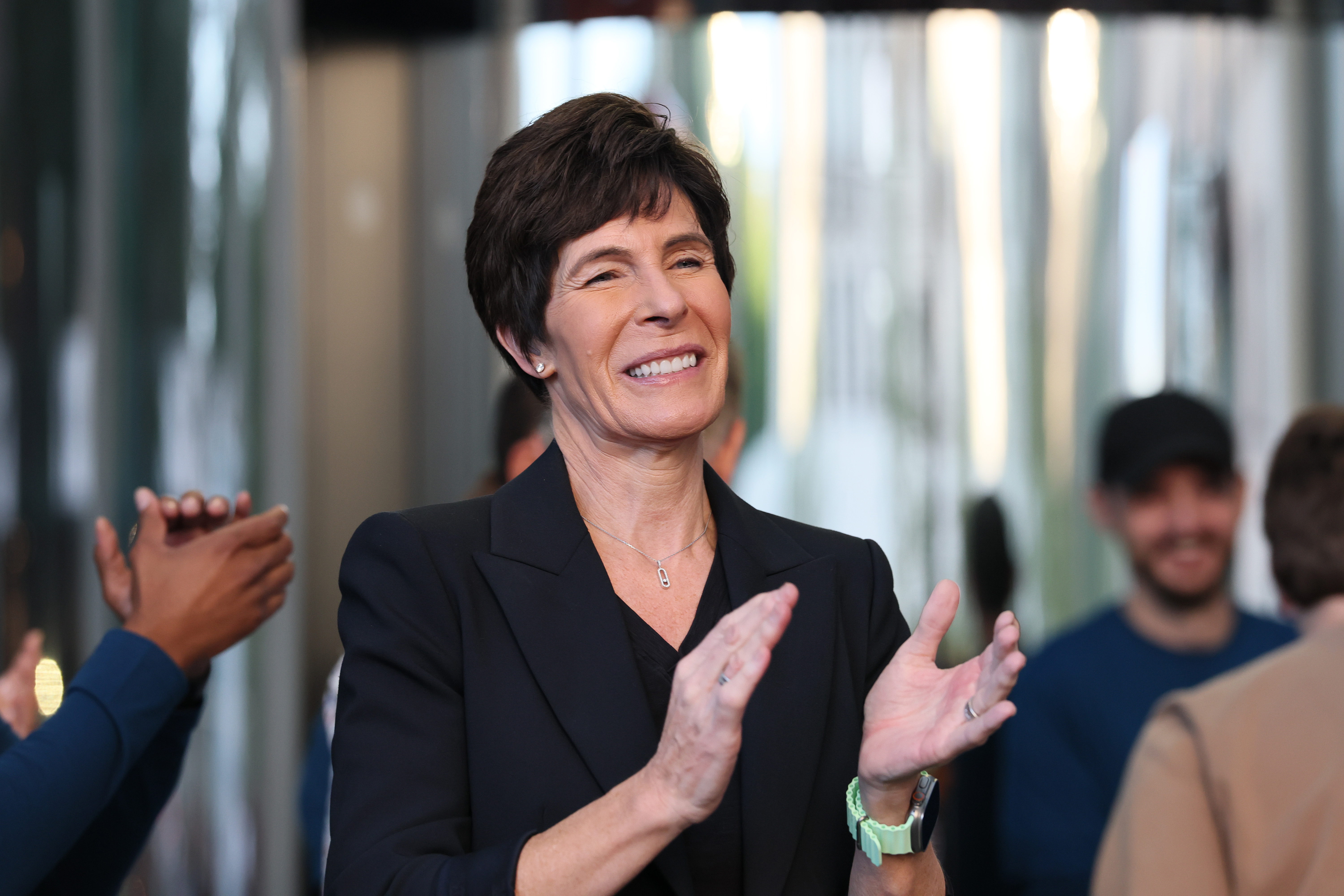 Deirdre O’Brien Apple’s Senior Vice President of Retail and People greets customers at the Fifth Avenue Apple Store on new product launch day on September 19, 2025 in New York City.