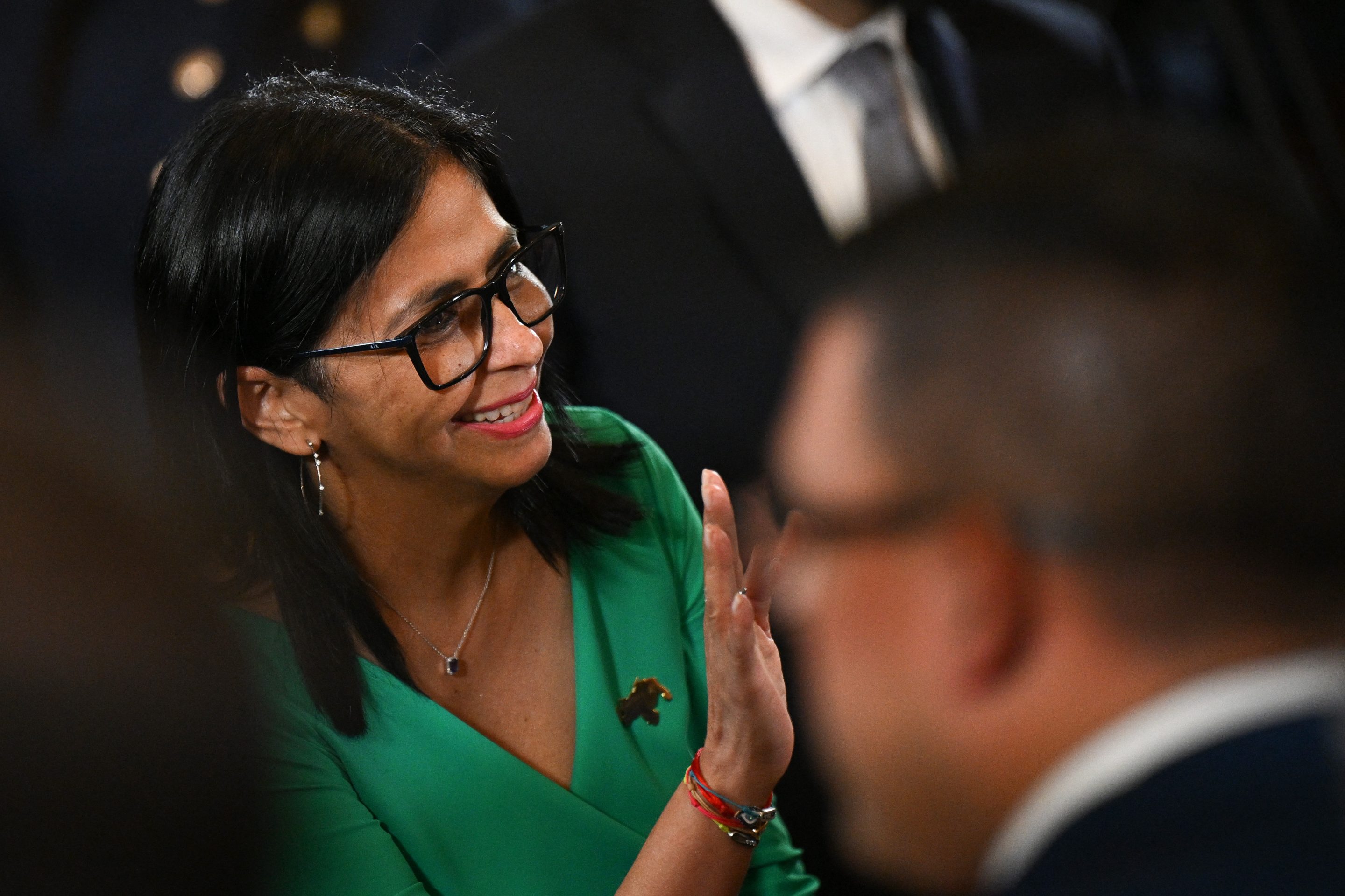 Venezuela's interim President Delcy Rodriguez waves after a session of the National Assembly in Caracas on January 5, 2026.