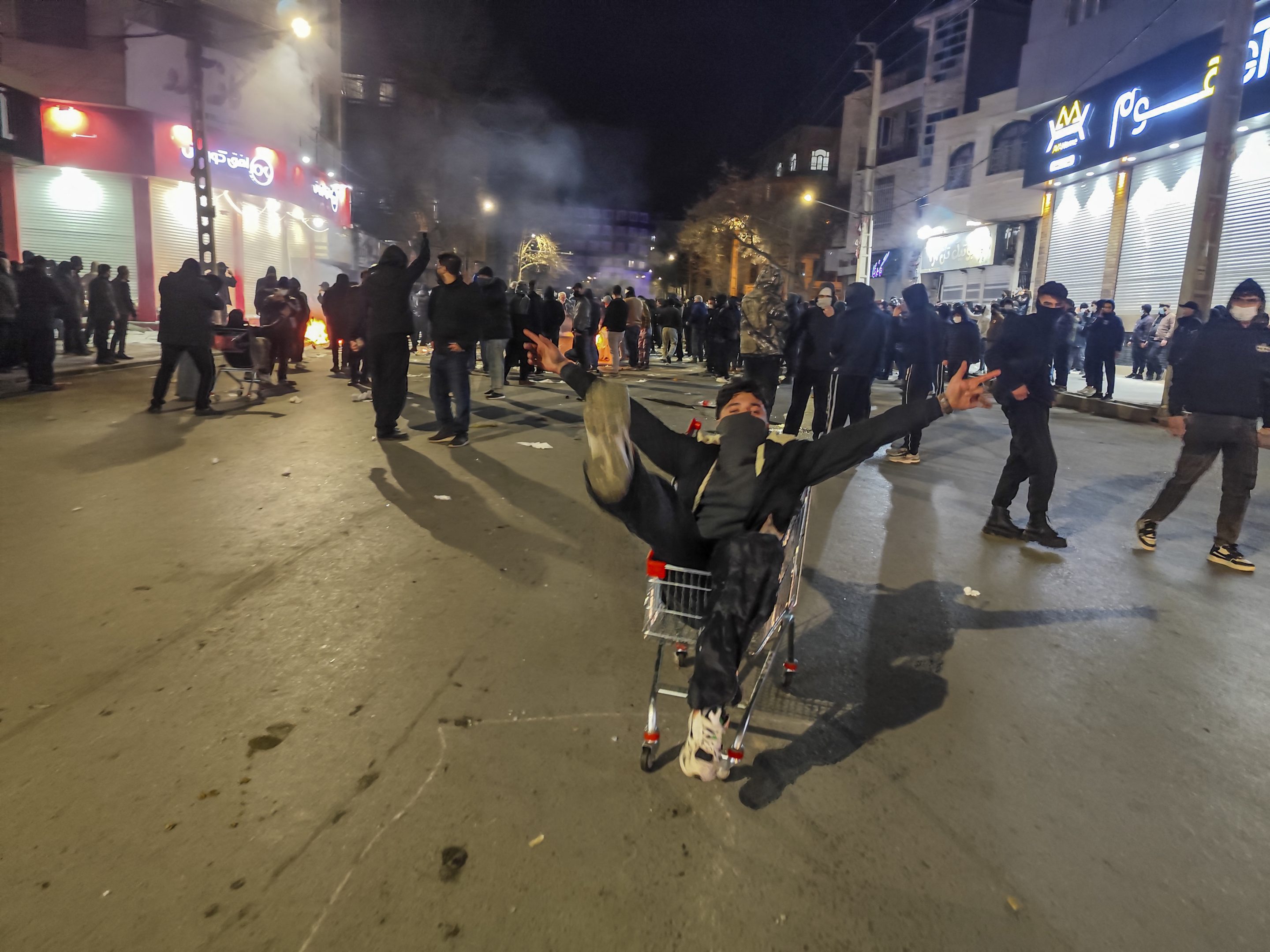 Iranians gather while blocking a street during a protest in Kermanshah, Iran on January 8, 2026.