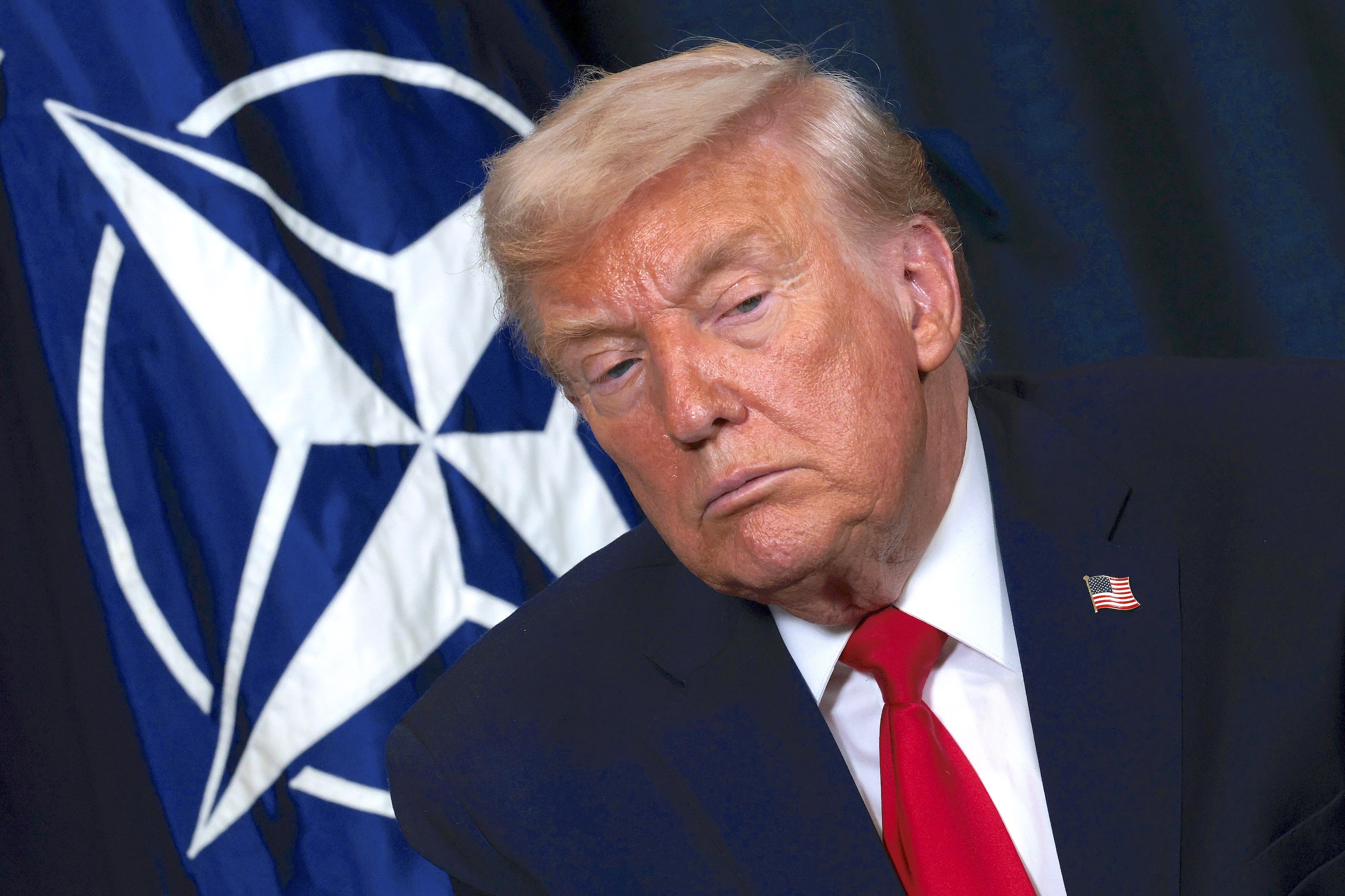 Photo: DAVOS, SWITZERLAND - JANUARY 21: U.S. President Donald Trump attends a bilateral meeting with NATO Secretary General Mark Rutte on the sidelines of the World Economic Forum (WEF) Annual Meeting on January 21, 2026 in Davos, Switzerland. The annual meeting of political and business leaders comes amid rising tensions between the United States and Europe over a range of issues, including Trump's vow to acquire Greenland, a semi-autonomous Danish territory. (Photo by Chip Somodevilla/Getty Images)