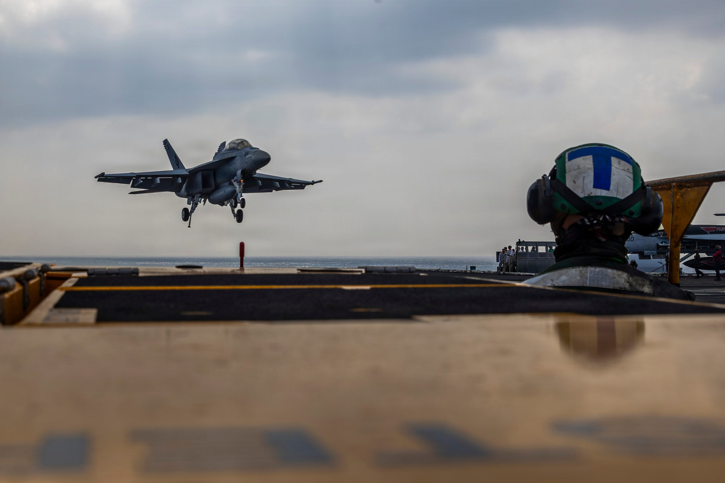 This photo provided by the U.S. Navy shows a Boeing F/A-18E Super Hornet landing on the U.S.S. Abraham Lincoln in the Indian Ocean on Jan. 22, 2026.