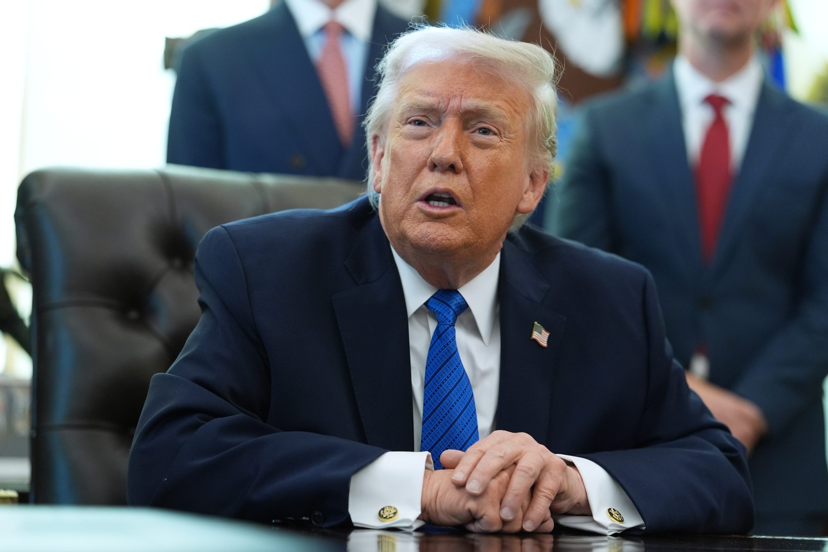 President Donald Trump speaks during an event in the Oval Office of the White House, Friday, Jan. 30, 2026.