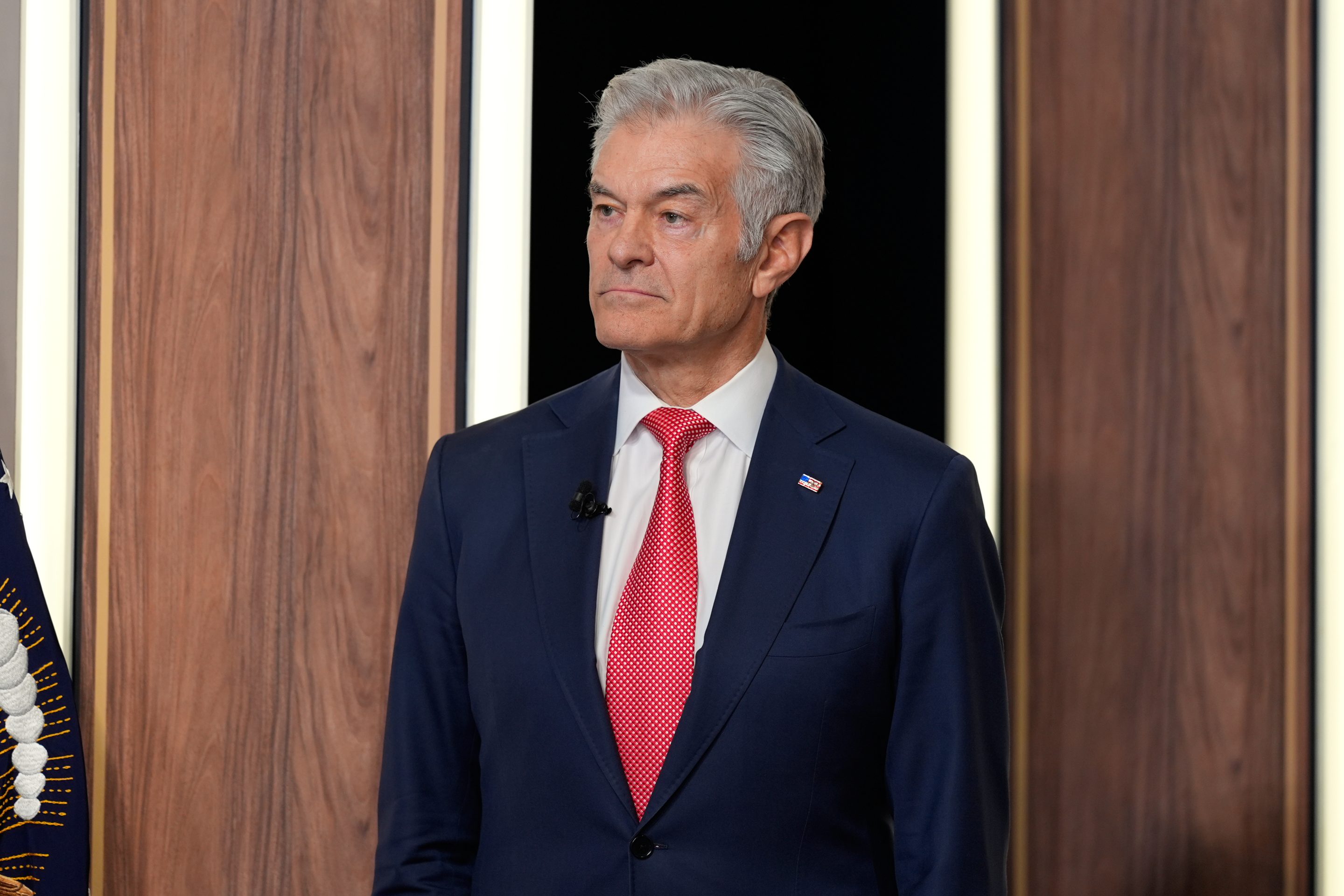Centers for Medicare & Medicaid Services administrator Dr. Mehmet Oz listens as President Donald Trump speaks about TrumpRx in the South Court Auditorium in the Old Eisenhower Executive Office Building on the White House campus, Thursday, Feb. 5, 2026.