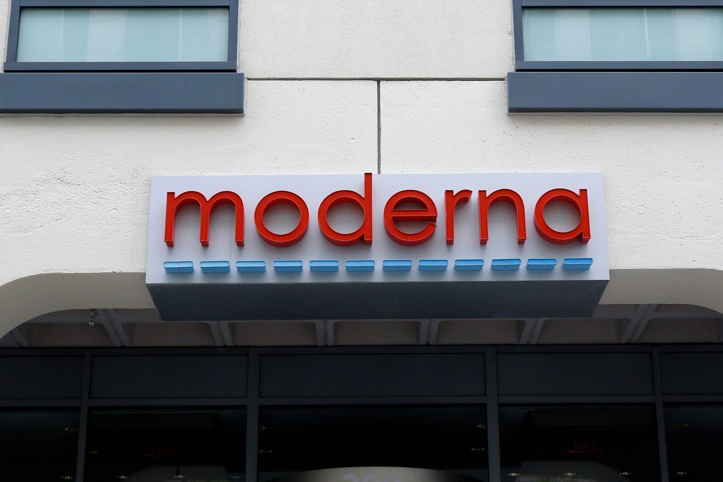 FILE - A sign marks an entrance to a Moderna building in Cambridge, Mass., May 18, 2020.