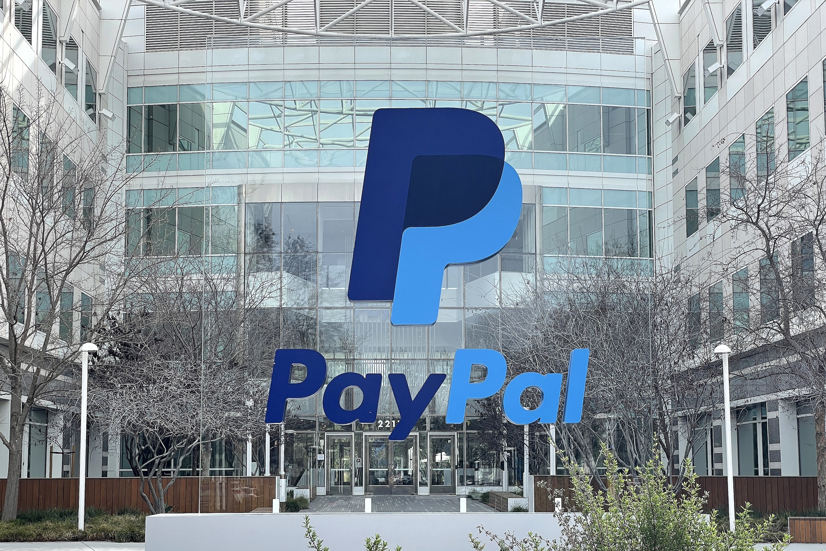 A sign is posted in front of PayPal headquarters in San Jose, California.