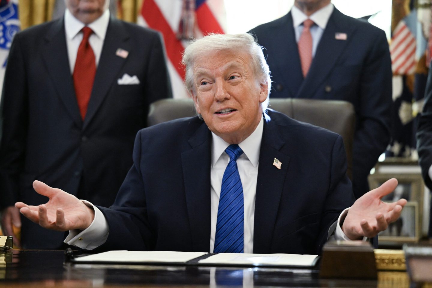 US President Donald Trump speaks before signing executive orders in the Oval Office in the White House in Washington, DC, on January 30, 2026.