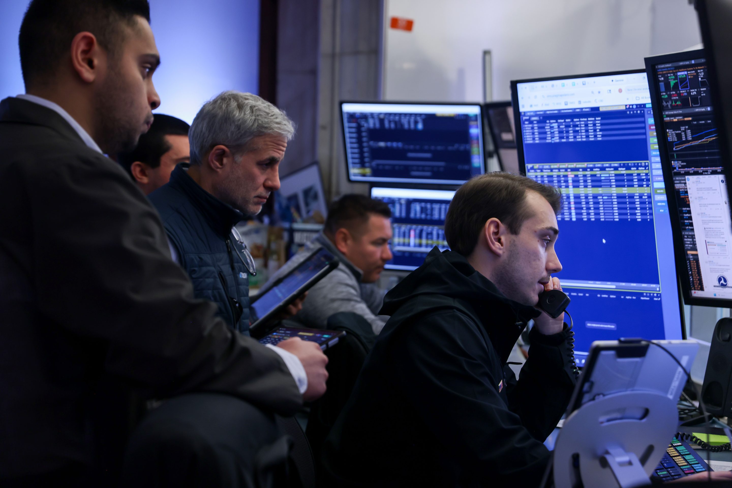 Traders work on the floor of the New York Stock Exchange on Wednesday, Feb. 11, 2026. 