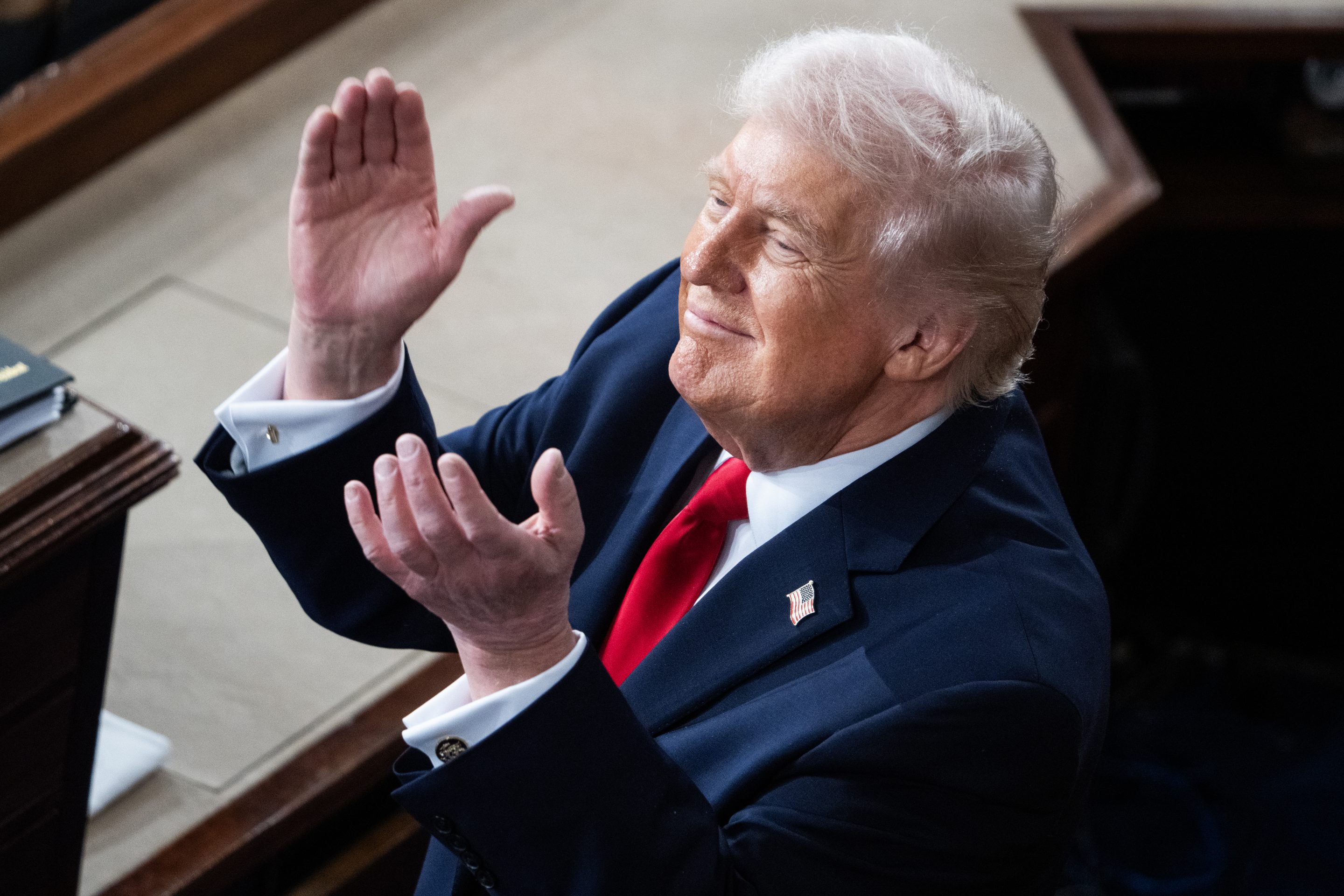 President Donald Trump applauds a guest during his State of the Union address in the House Chamber of the U.S. Capitol, Feb. 24, 2026.