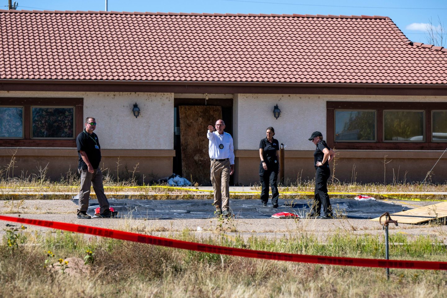 Police tape outside of a funeral parlor