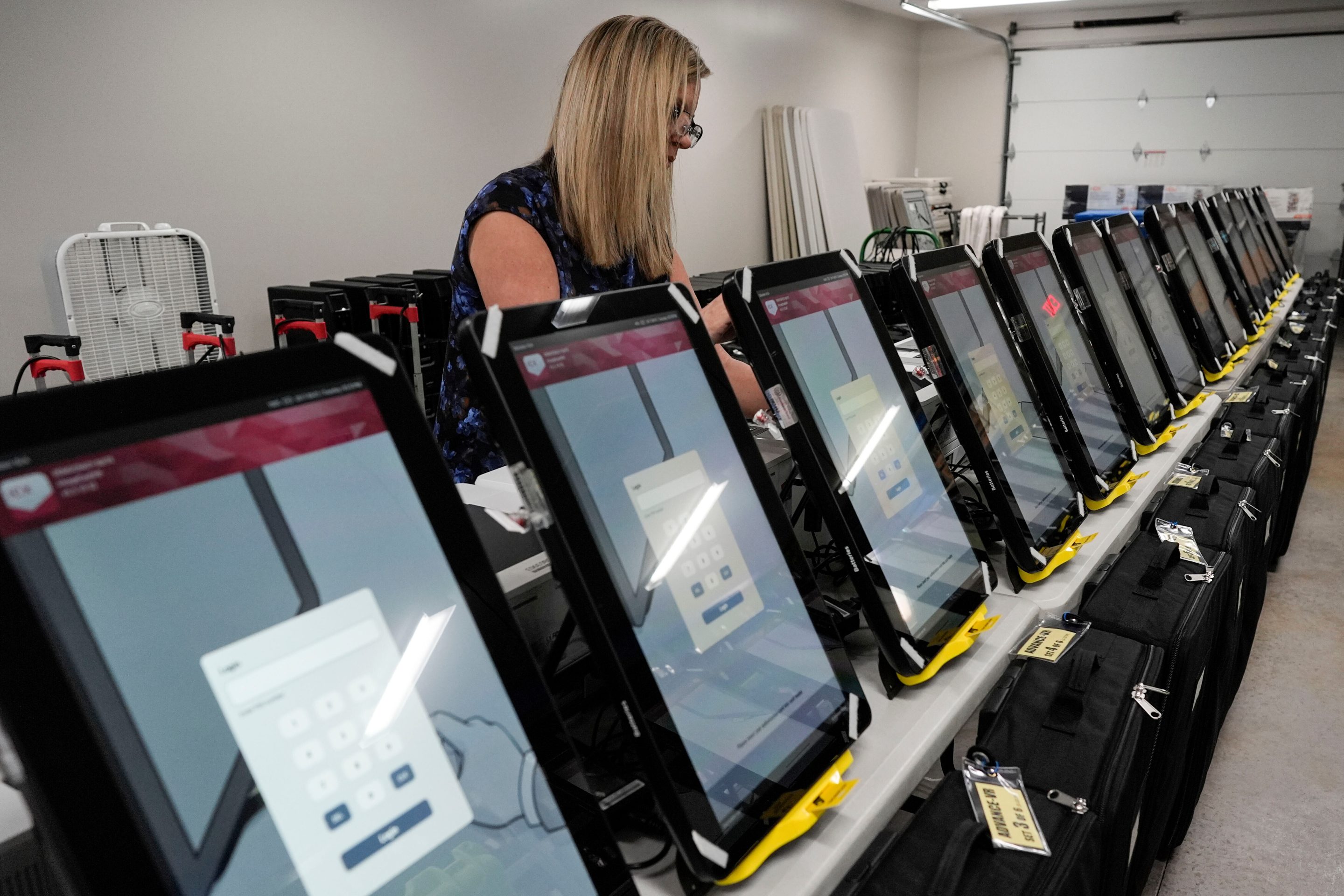 woman near voting machines