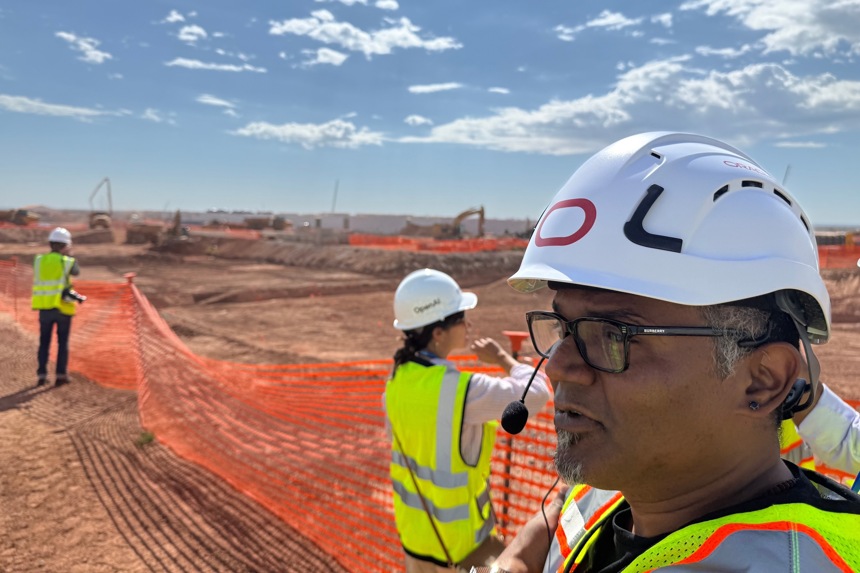 Mahesh Thiagarajan, executive vice president of Oracle Cloud Infrastructure, shows media the Stargate artificial intelligence data center project in Abilene, Texas on Sept. 23, 2025.