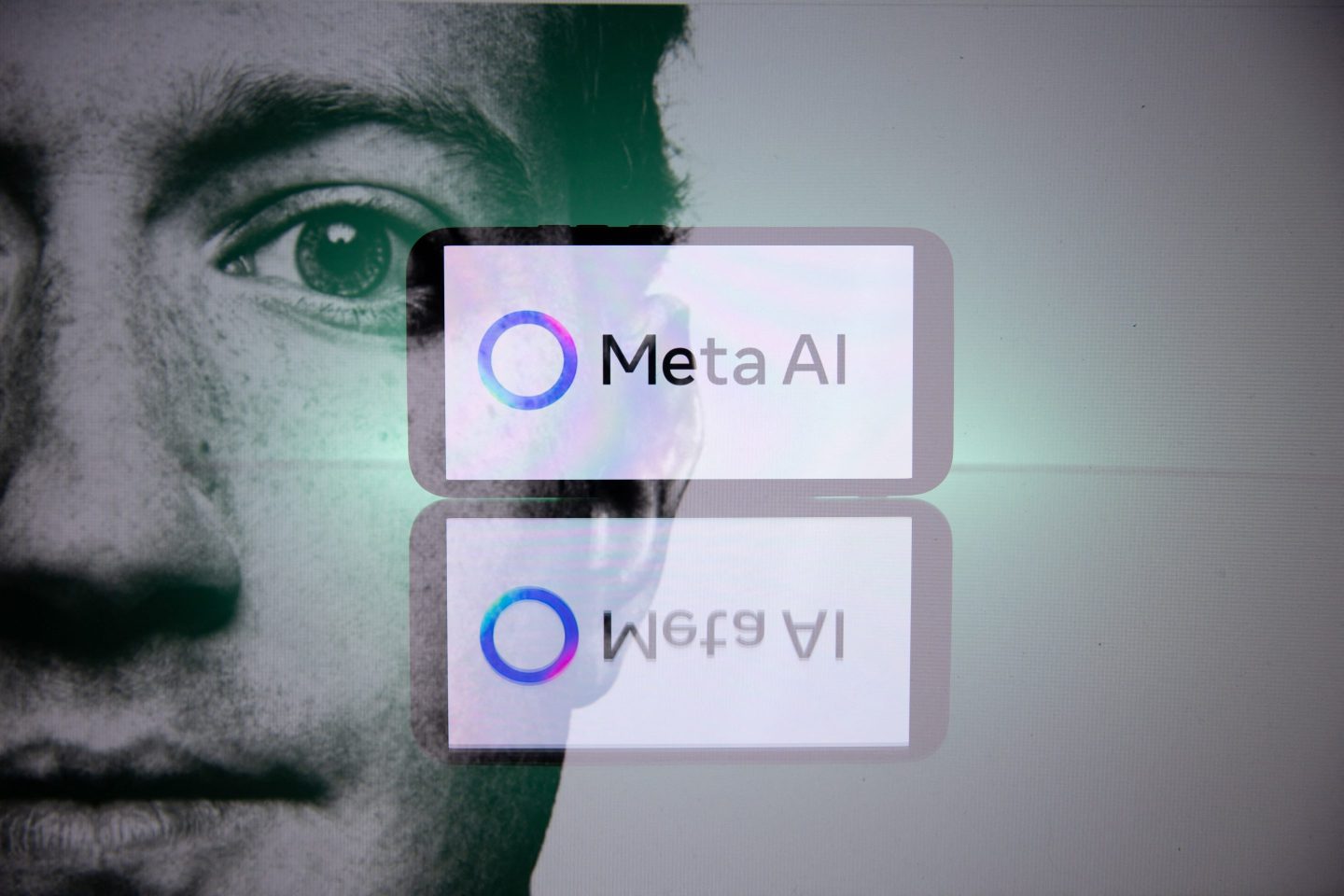 Double exposure photograph of a portrait of Mark Zuckerberg and a telephone displaying the Meta group s artificial intelligence logo at Kerlouan in Brittany in France on April 11 2025. (Photo by Vincent Feuray / Hans Lucas / Hans Lucas via AFP) (Photo by VINCENT FEURAY/Hans Lucas/AFP via Getty Images)