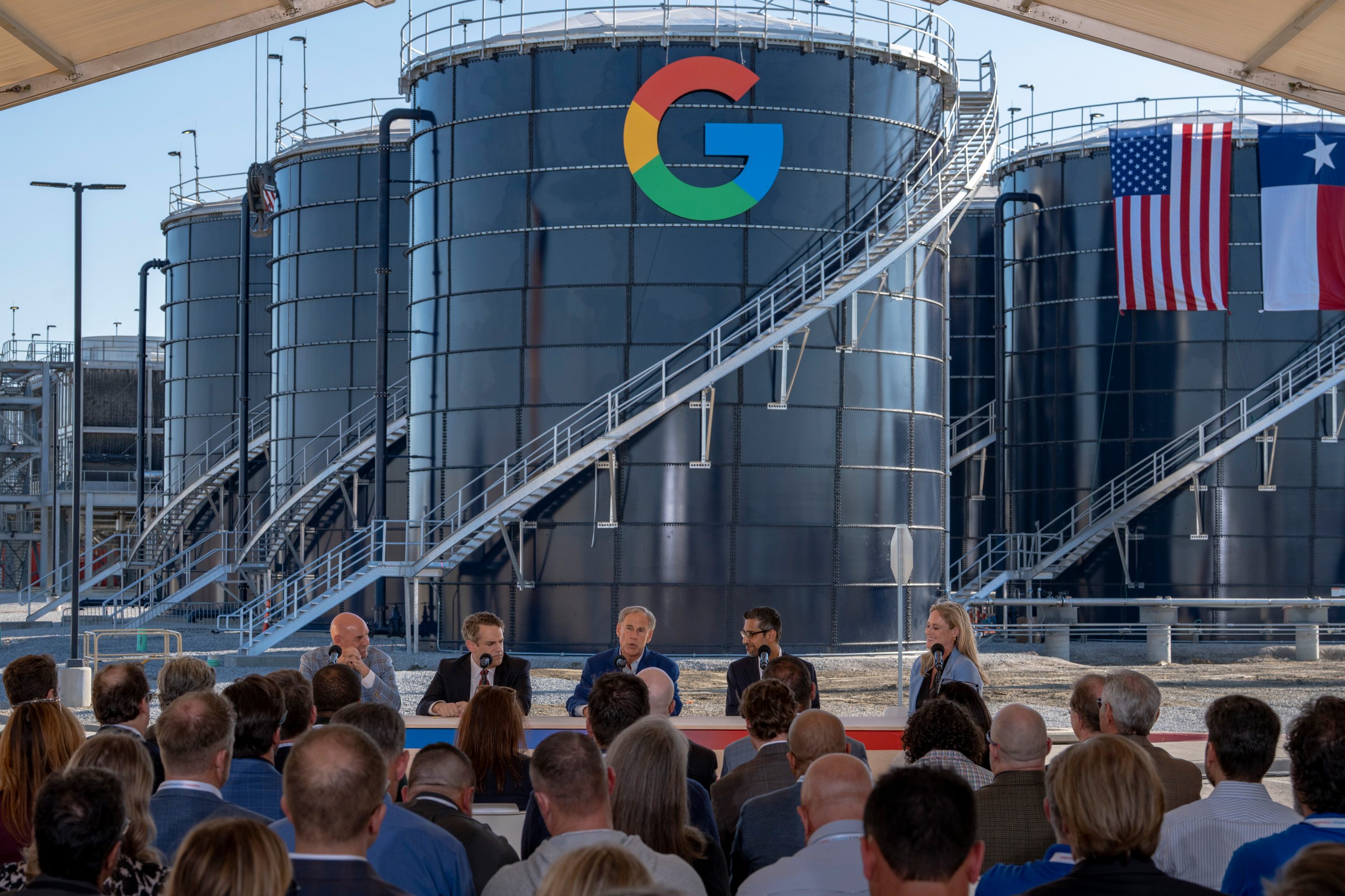 Texas Gov. Greg Abbott and Google CEO Sundar Pichai speak at a press conference in front of a Google data center.