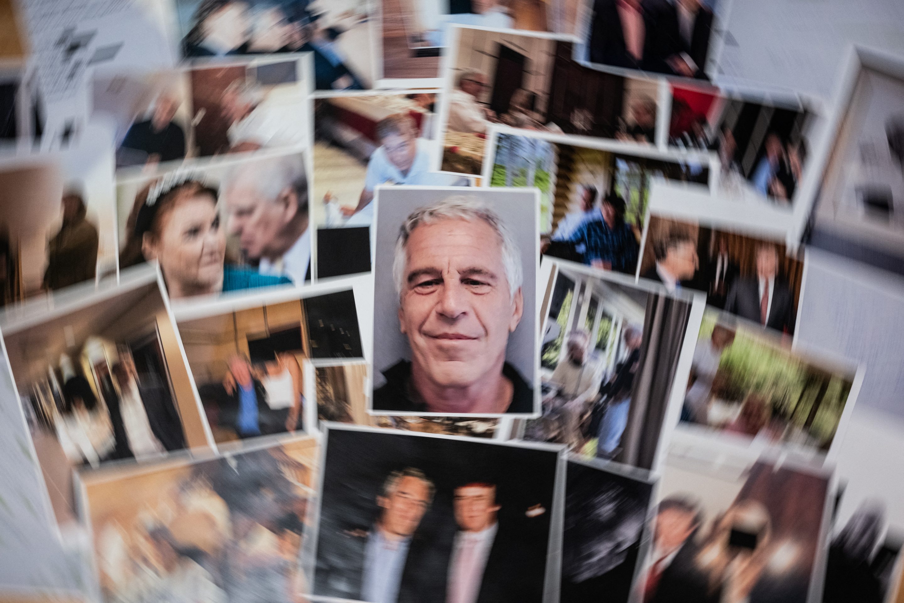 This photograph taken in Le-Perreux-sur-Marne, outside Paris on February 9, 2026 shows undated pictures provided by the US Department of Justice on January 30, 2026 as part of the Jeffrey Epstein files