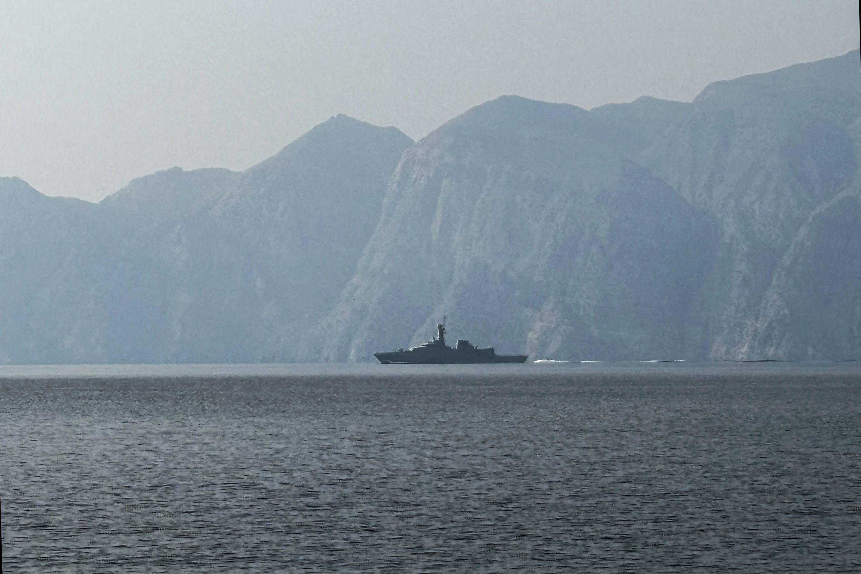 A Navy vessel is seen sailing in the Strait of Hormuz, a vital waterway through which much of the world’s oil and gas passes, on March 1, 2026.
