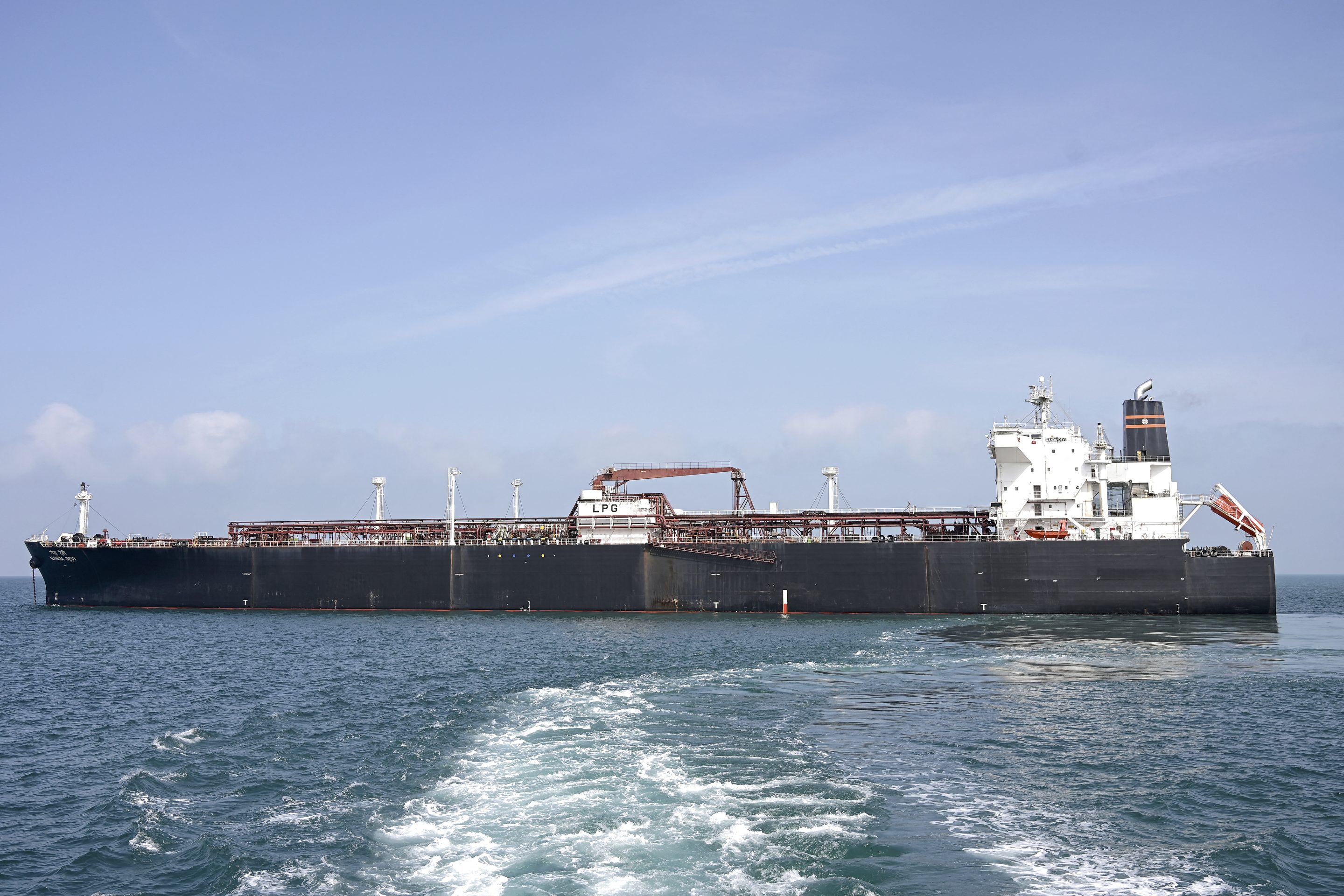 Indian vessel 'Nanda Devi' carrying liquefied petroleum gas (LPG) arrives at Vadinar Port in the Jamnagar district of Gujarat state on March 17, 2026 after Iran allowed it to pass through the Strait of Hormuz.