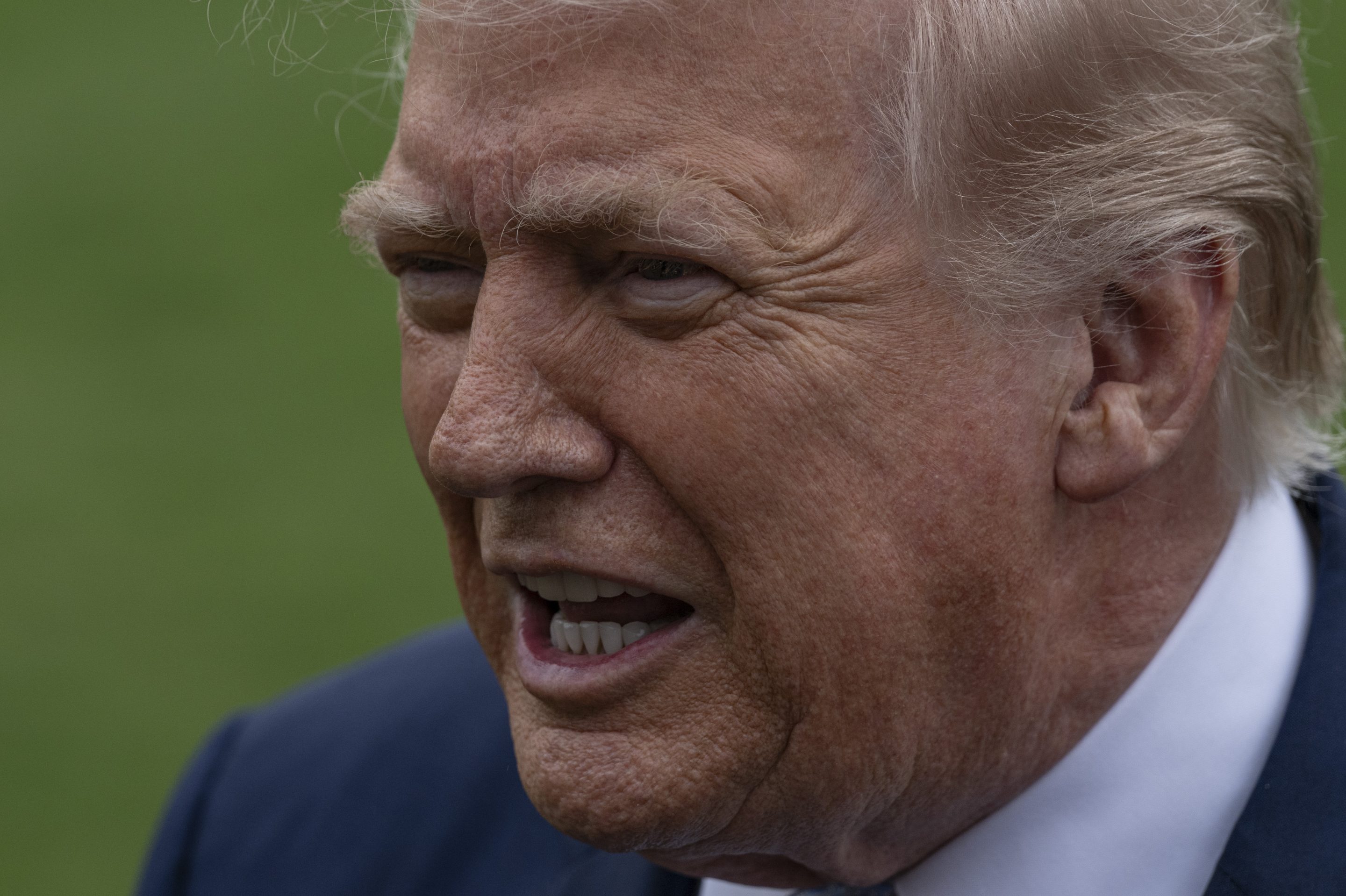 President Donald Trump speaks to the press before his departs the White House en route Miami, Florida on March 20, 2026, in Washington DC.